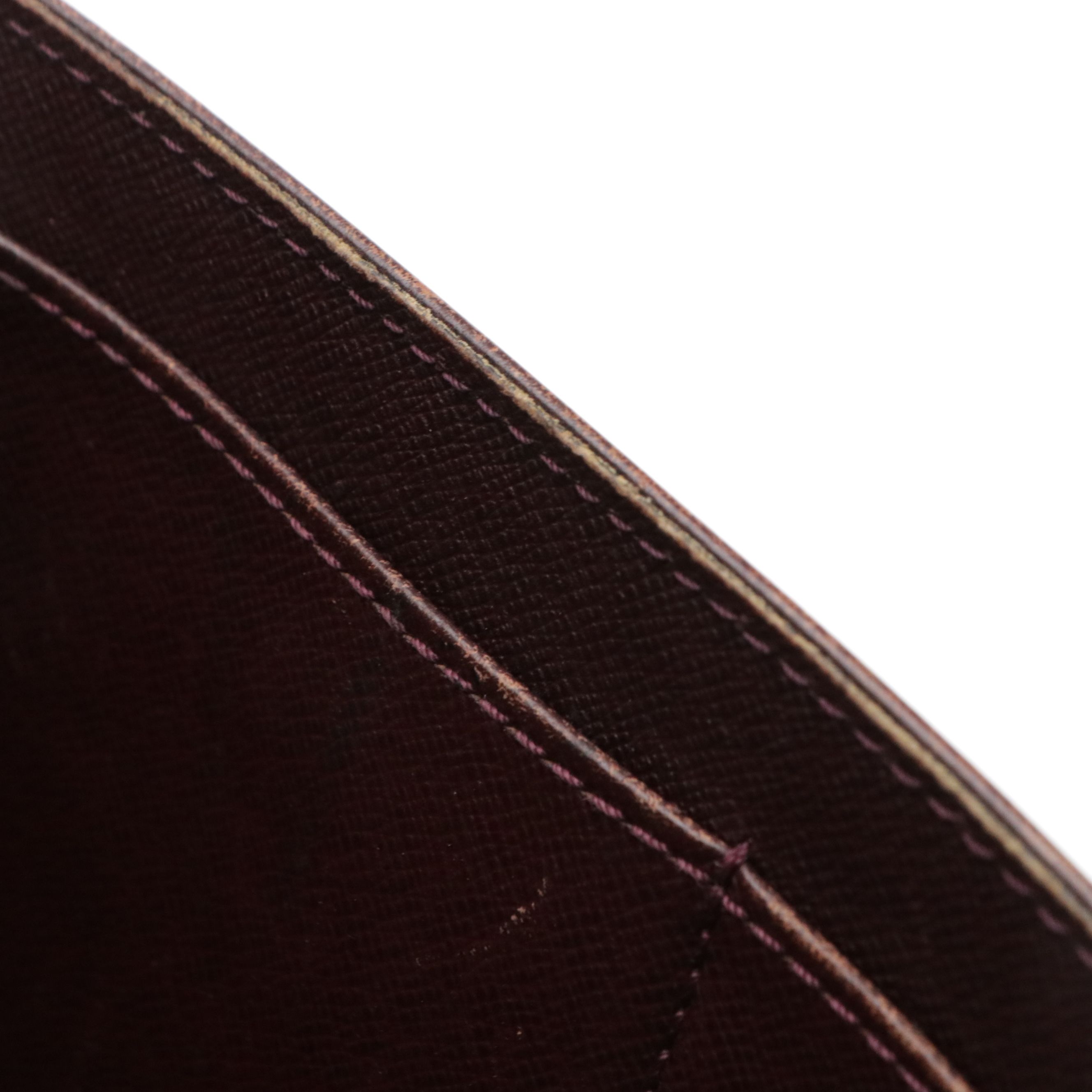 Louis Vuitton Pochette Kourad Wristlet in Taïga Leather