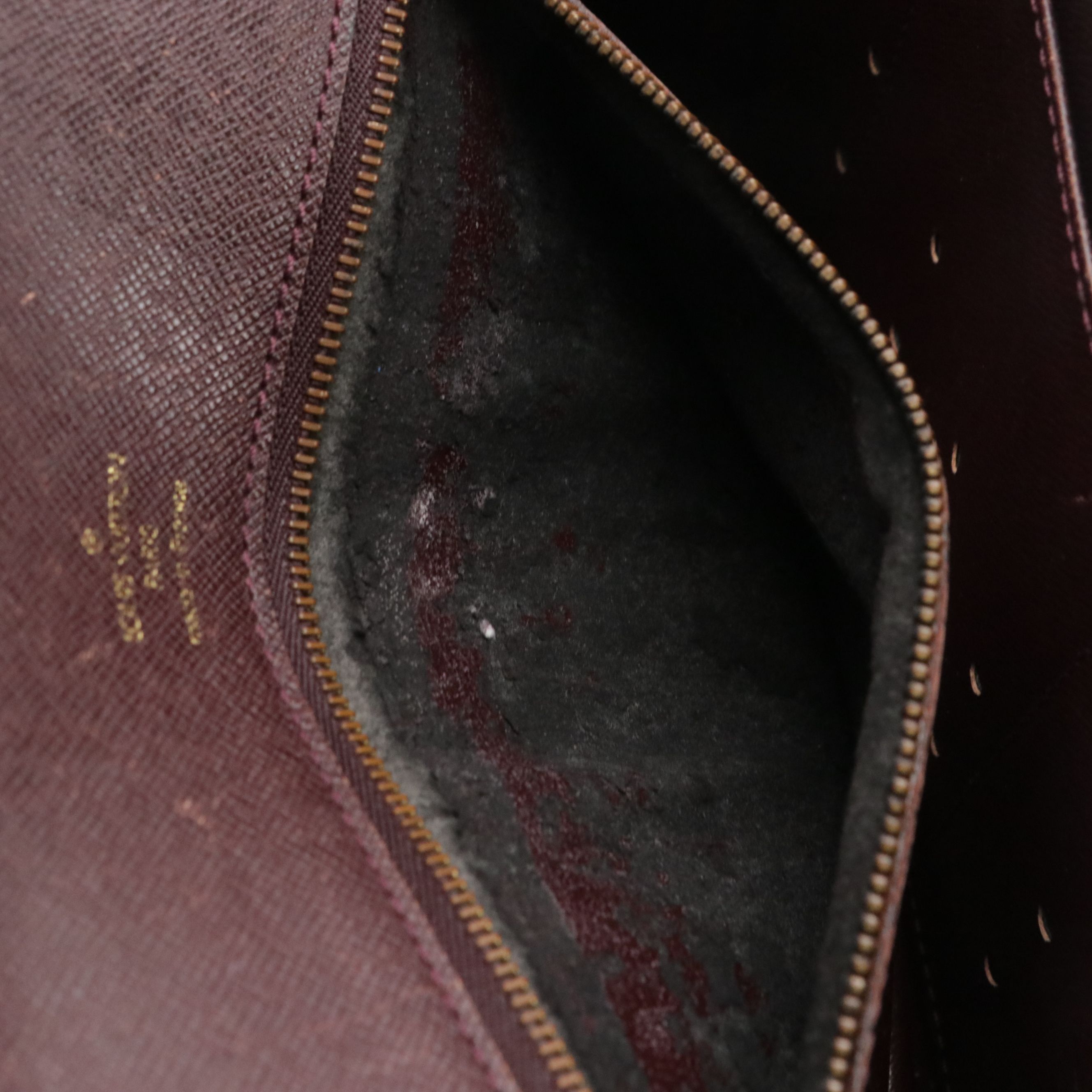 Louis Vuitton Pochette Kourad Wristlet in Taïga Leather