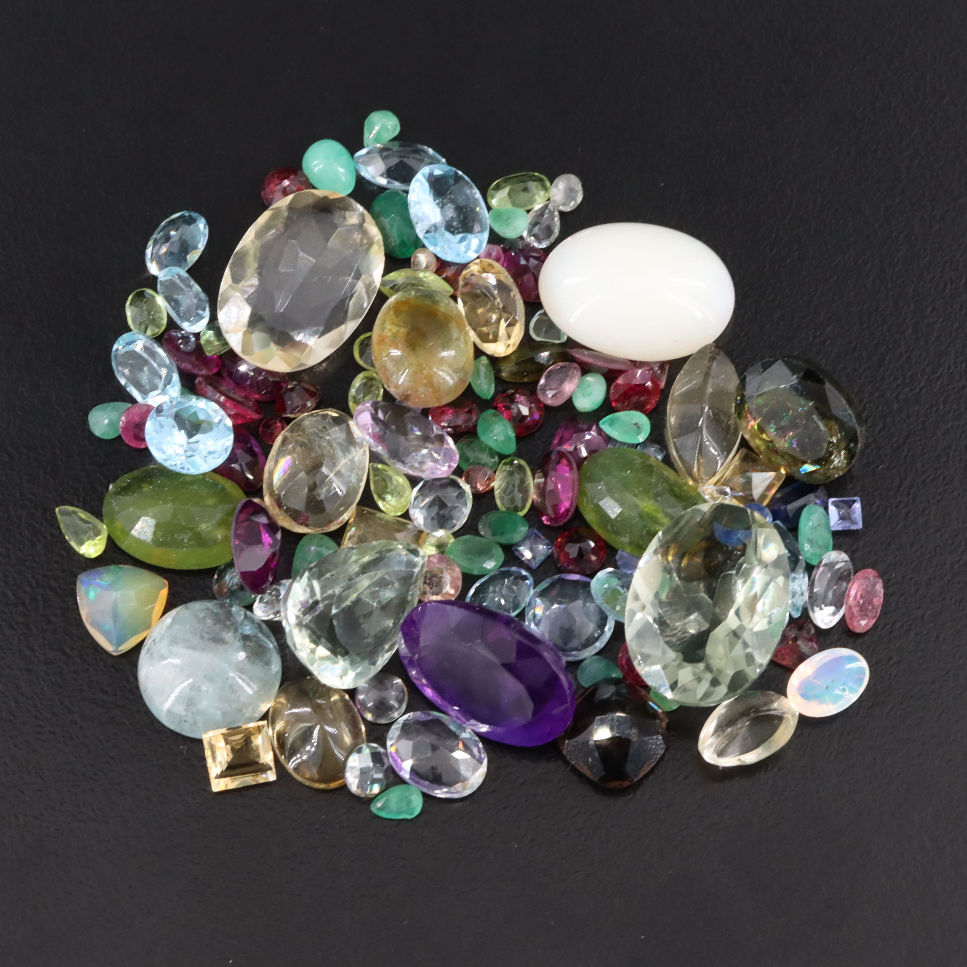 Loose 97.48 CTW Gemstones Including Amethyst, Topaz and Citrine