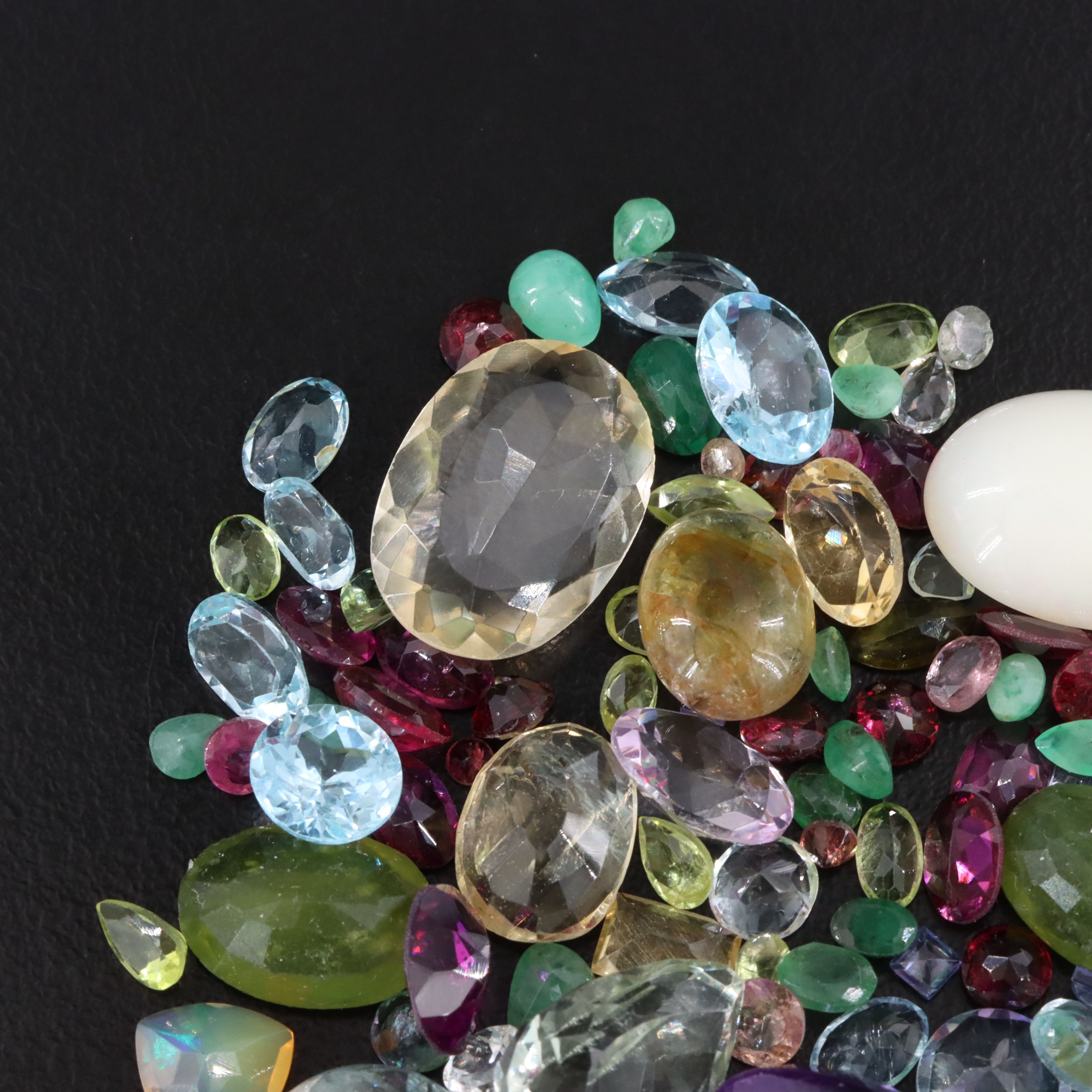 Loose 97.48 CTW Gemstones Including Amethyst, Topaz and Citrine