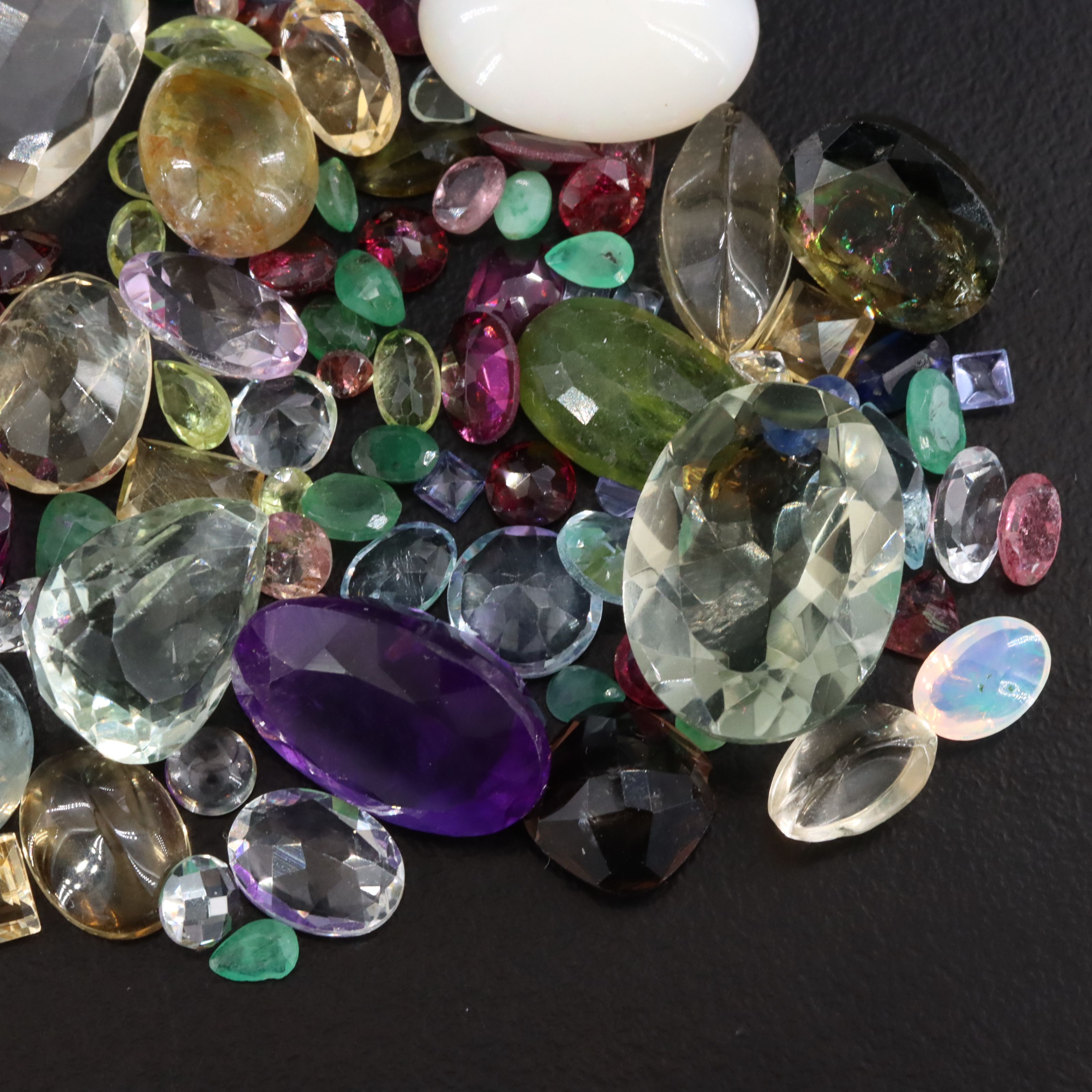 Loose 97.48 CTW Gemstones Including Amethyst, Topaz and Citrine