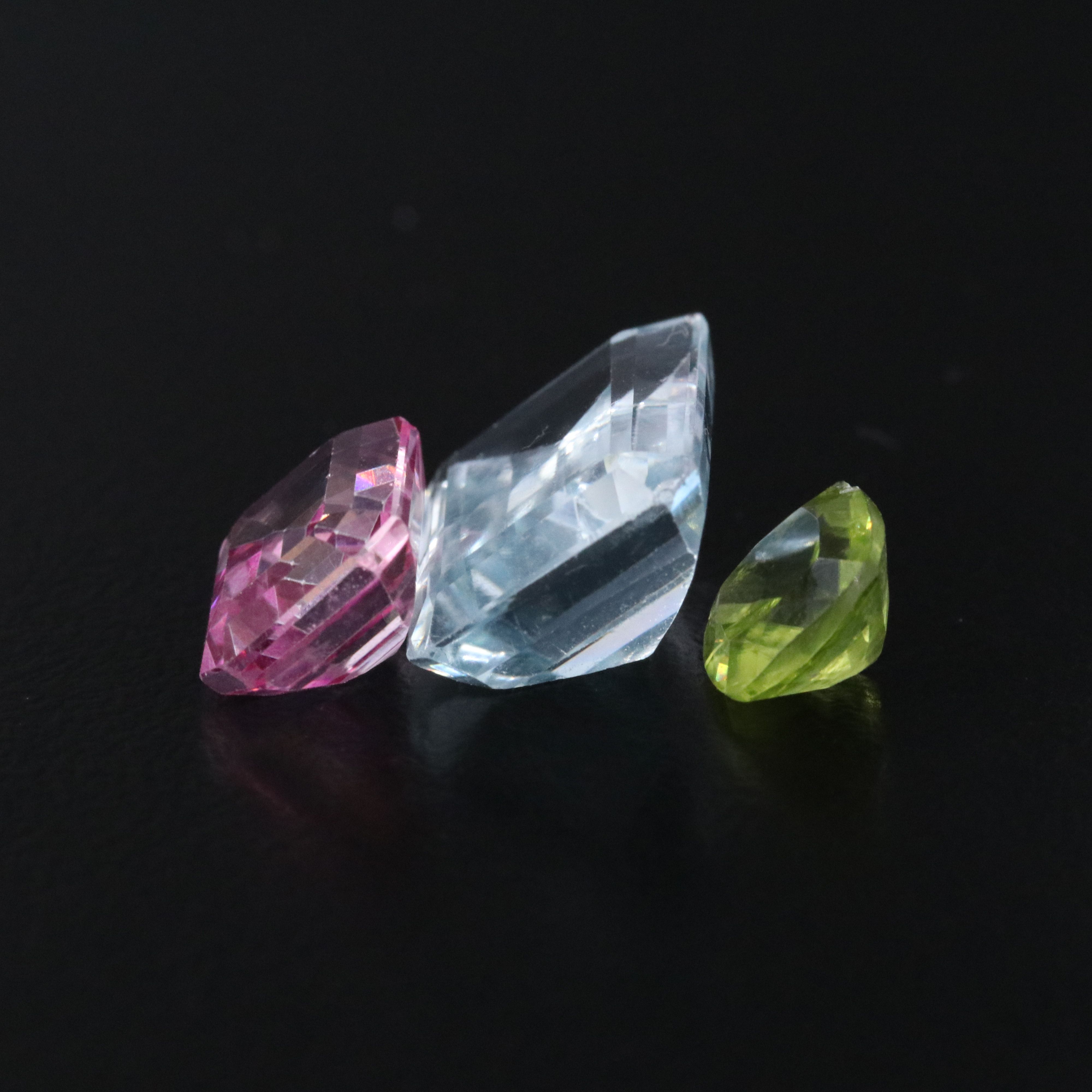 Loose 66.88 CTW Mixed Gemstone Lot Featuring Amethyst, Blue Topaz, and Citrine