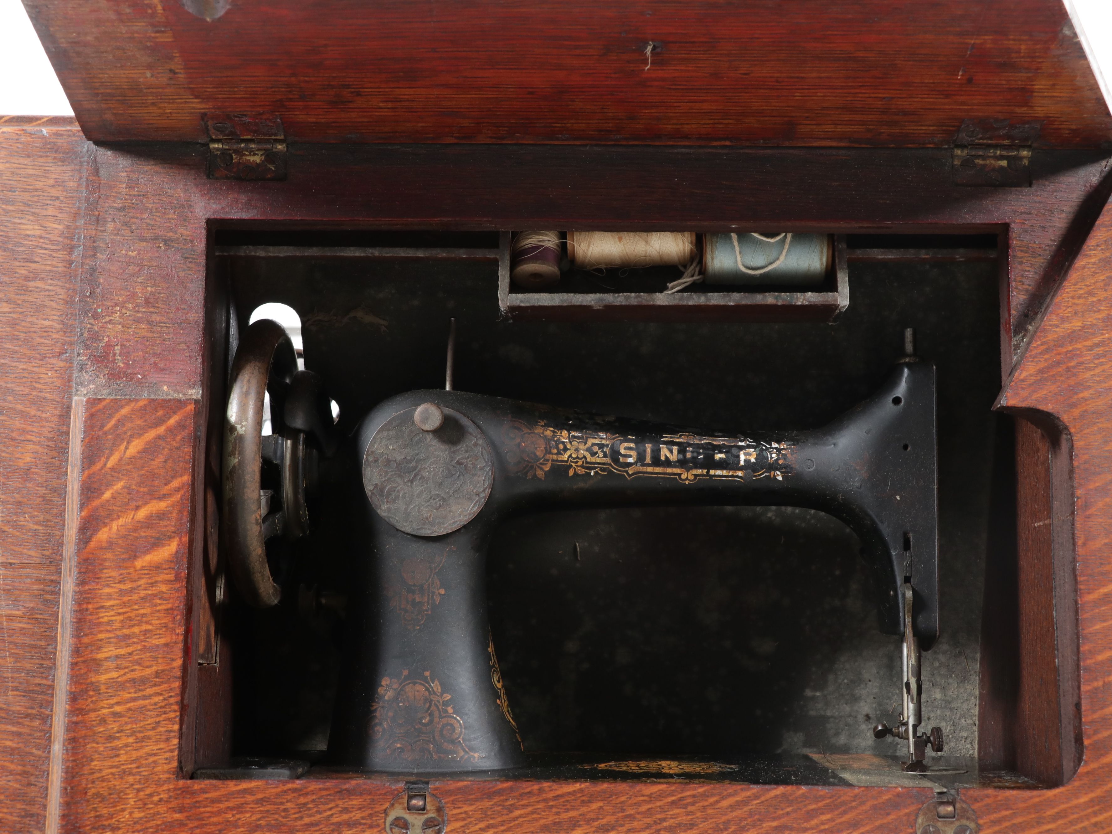 Singer Sewing Machine Model 27 with Treadle and Oak Cabinet, 1903
