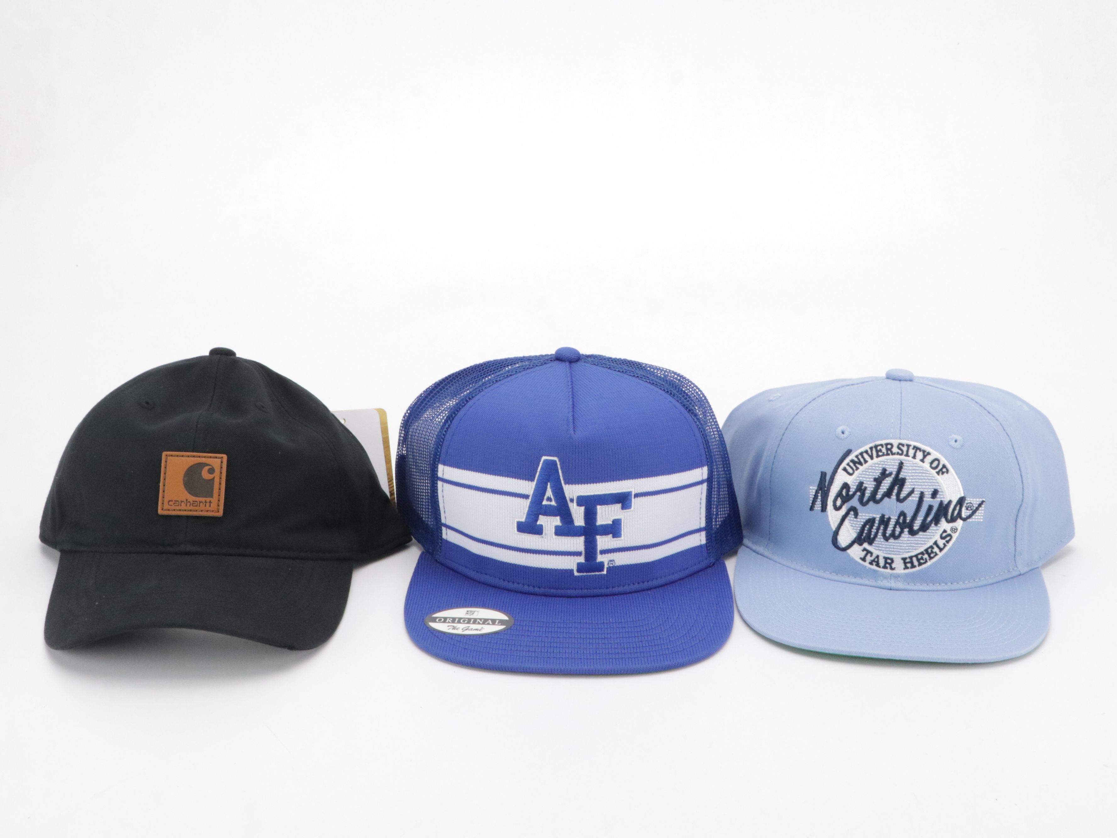 Assorted Baseball Hats Including Carhartt, UNC, MBL and More