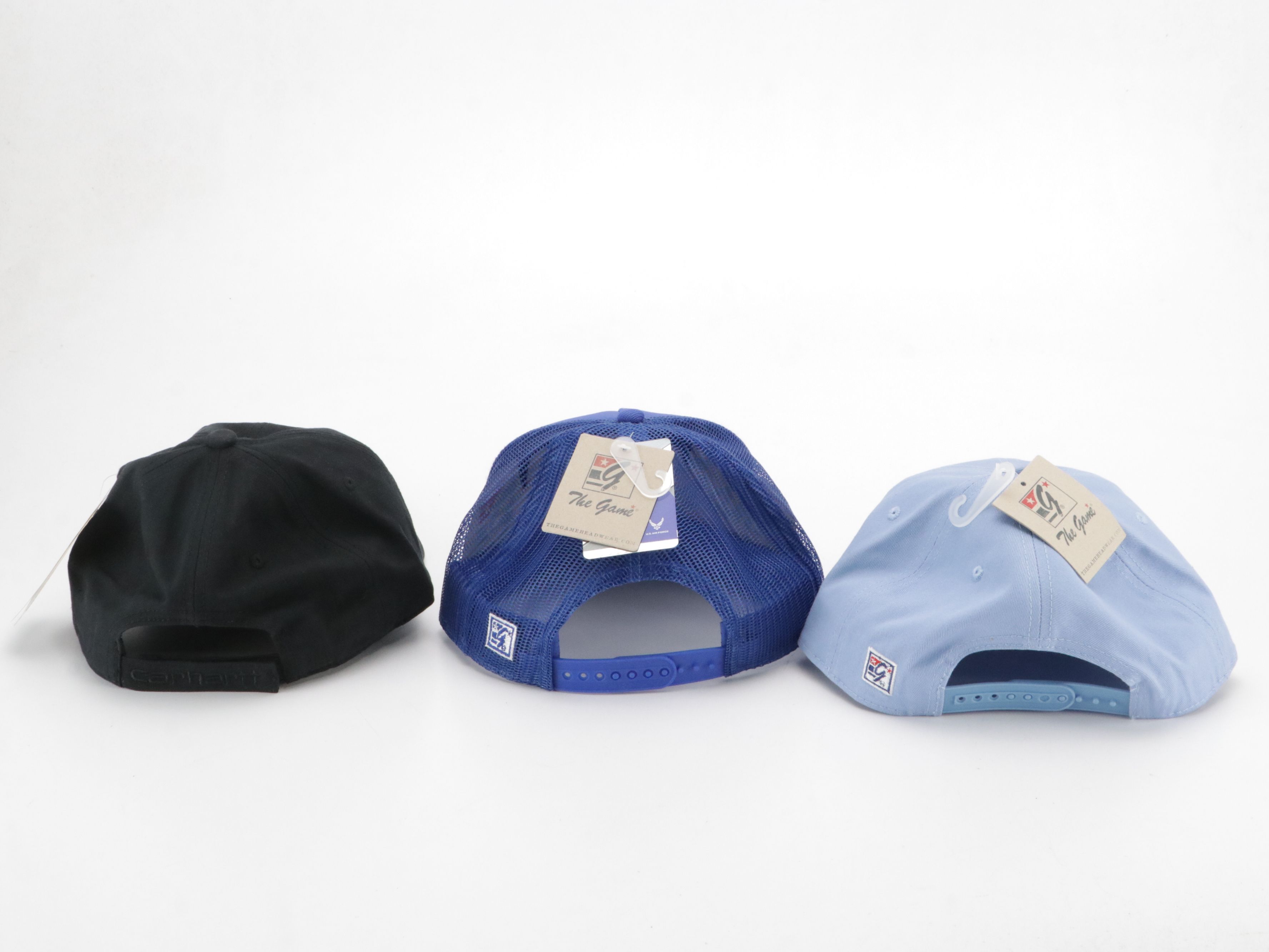 Assorted Baseball Hats Including Carhartt, UNC, MBL and More