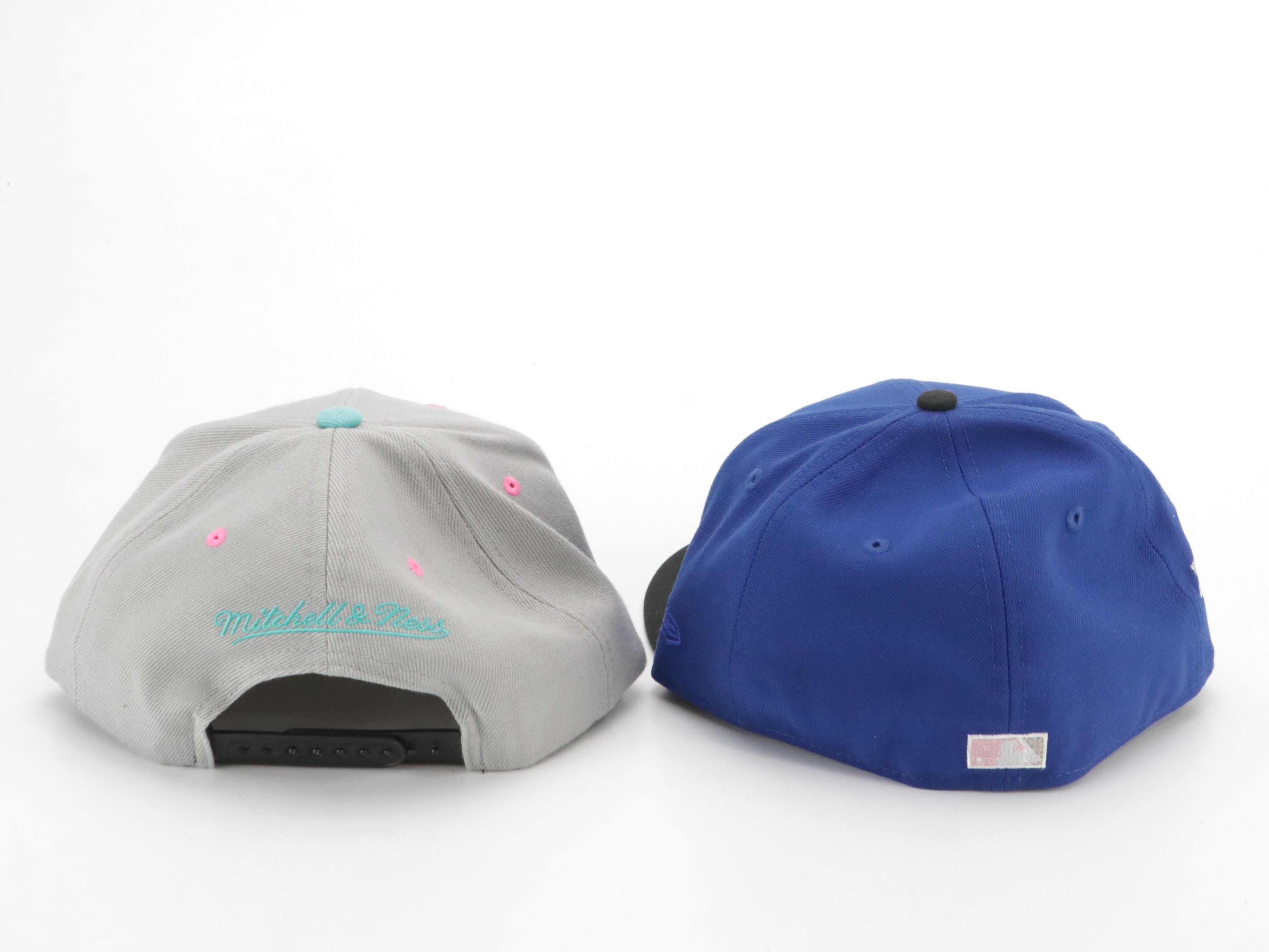 Assorted Baseball Hats Including Carhartt, UNC, MBL and More