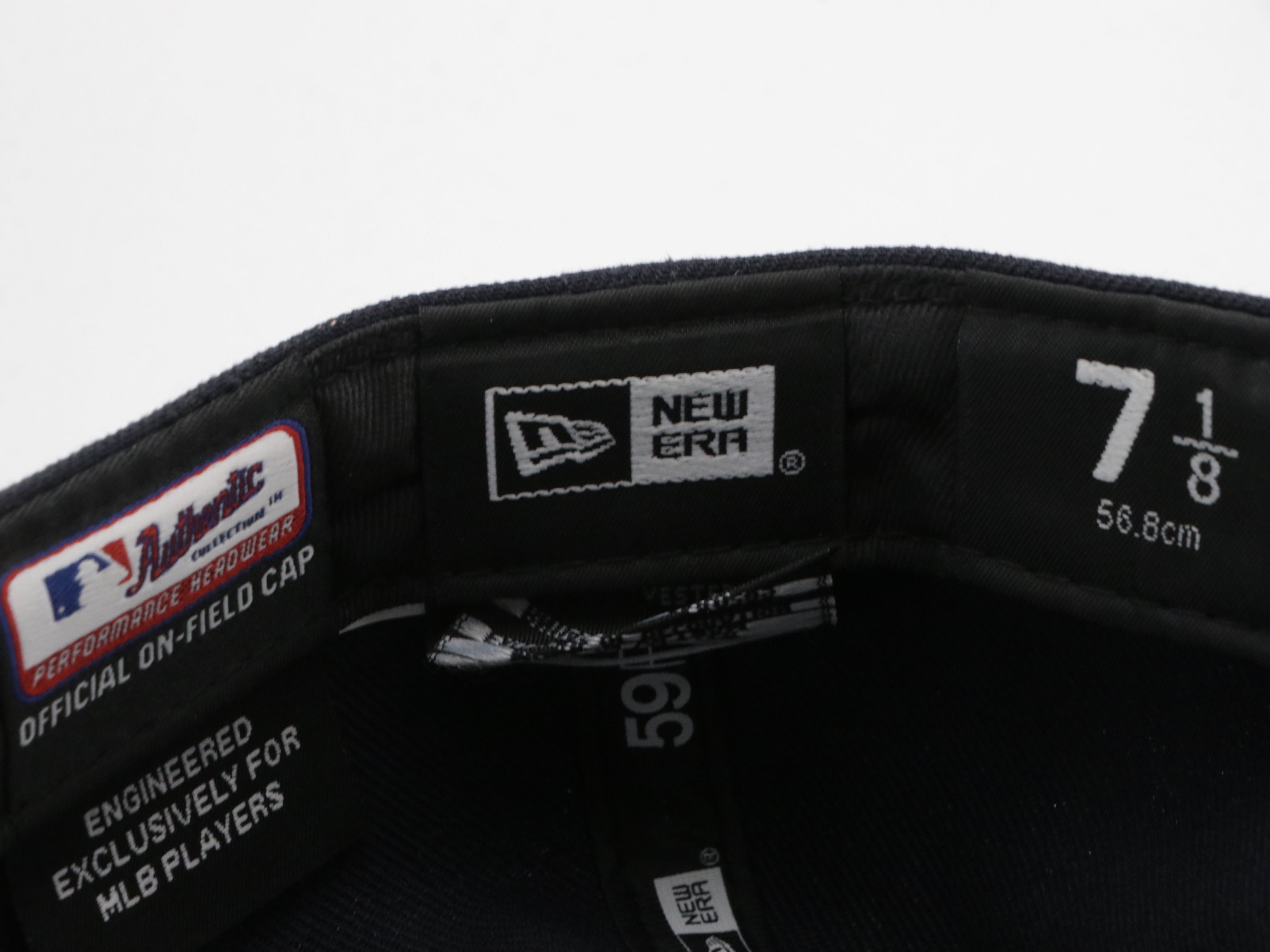 Assorted Baseball Hats Including Carhartt, UNC, MBL and More