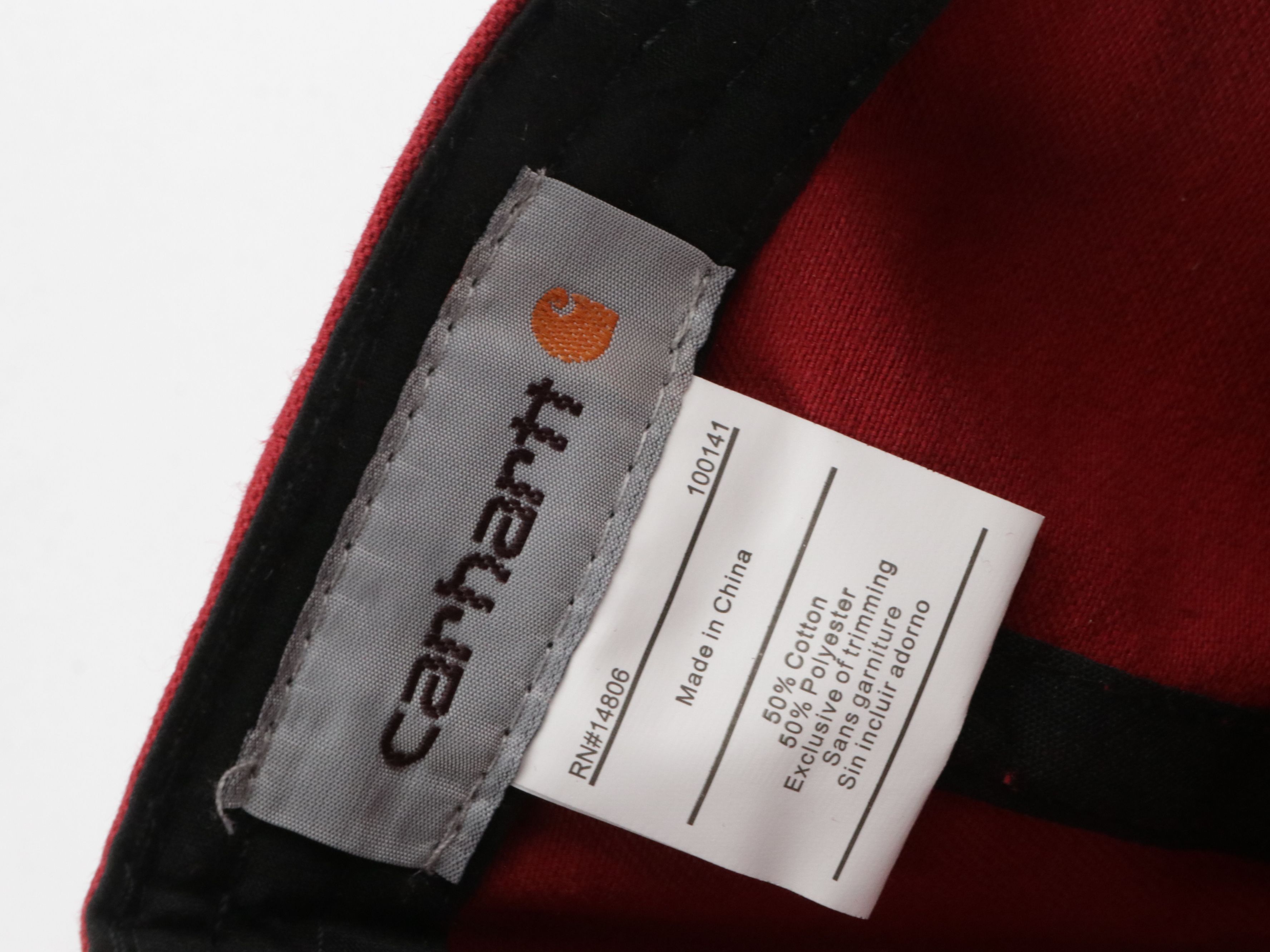 Assorted Baseball Hats Including Carhartt, UNC, MBL and More