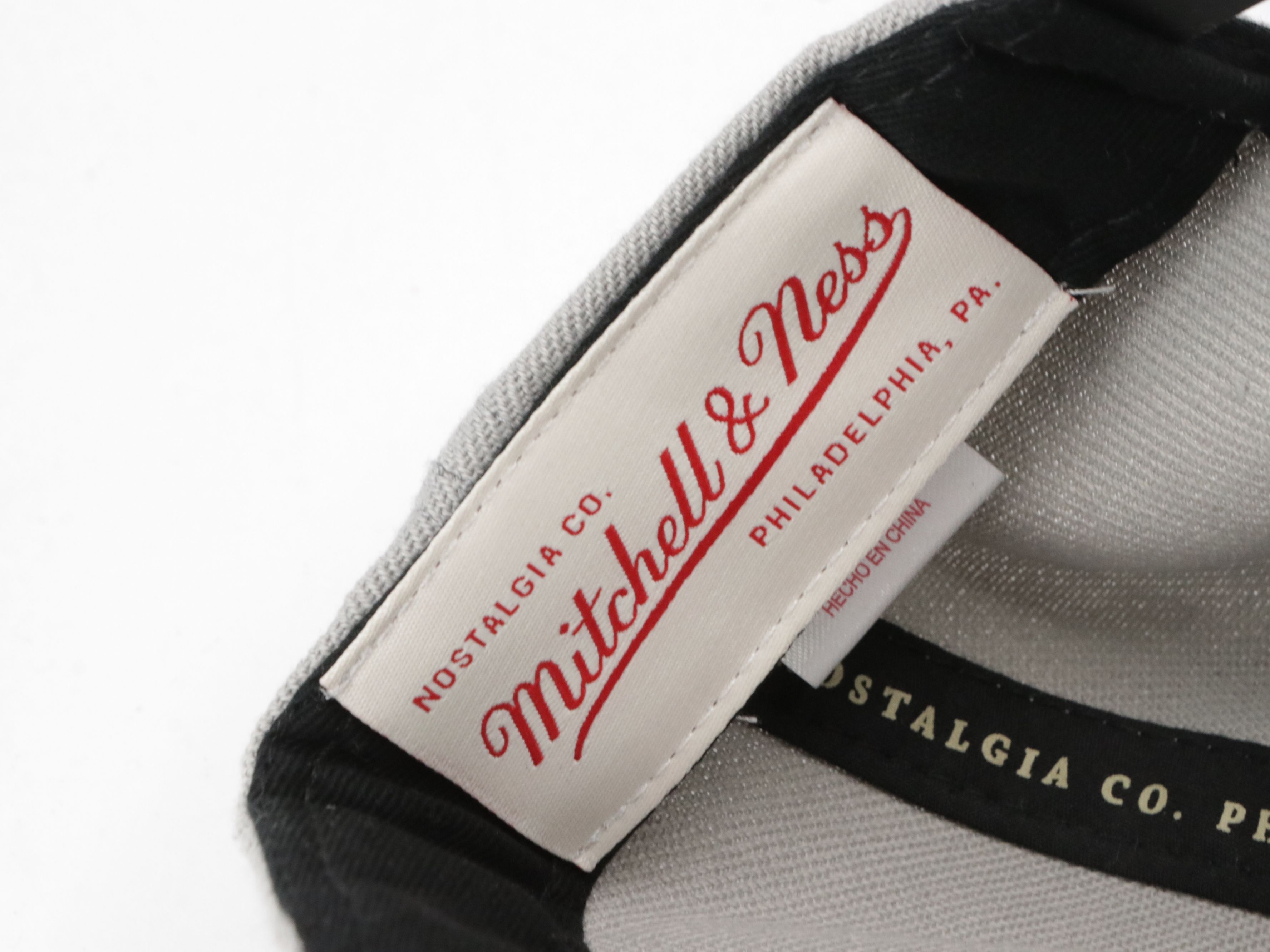 Assorted Baseball Hats Including Carhartt, UNC, MBL and More