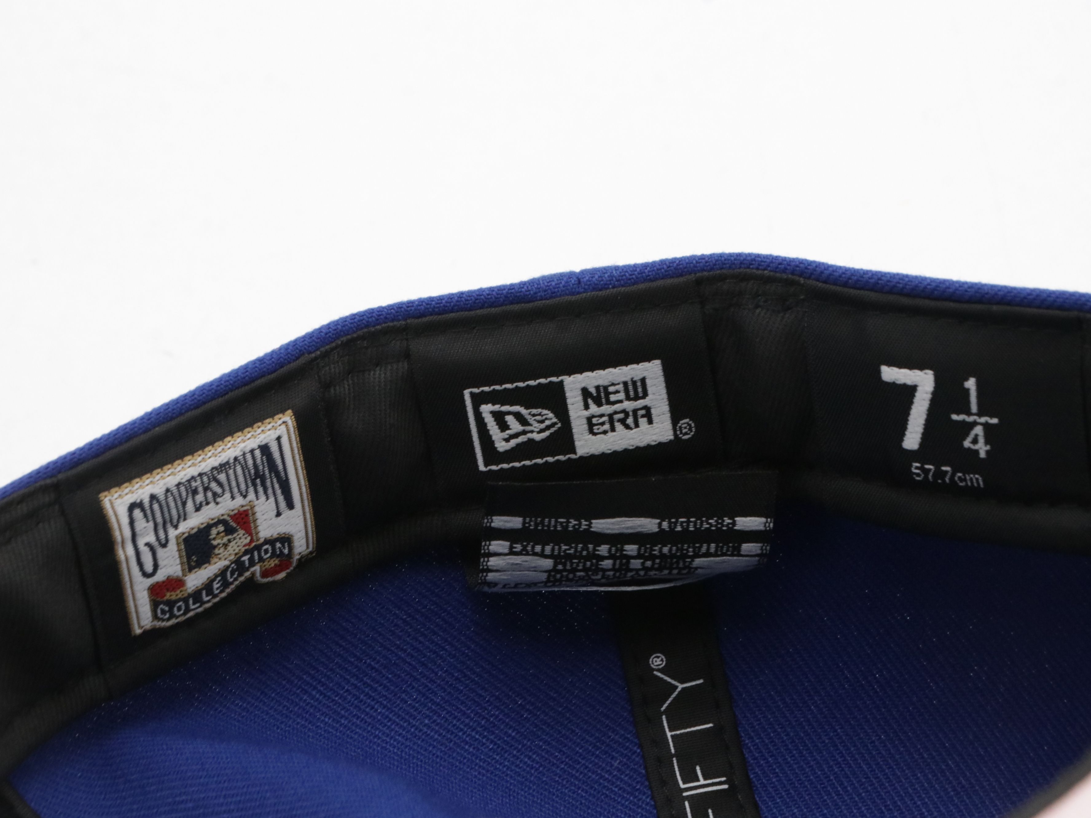 Assorted Baseball Hats Including Carhartt, UNC, MBL and More