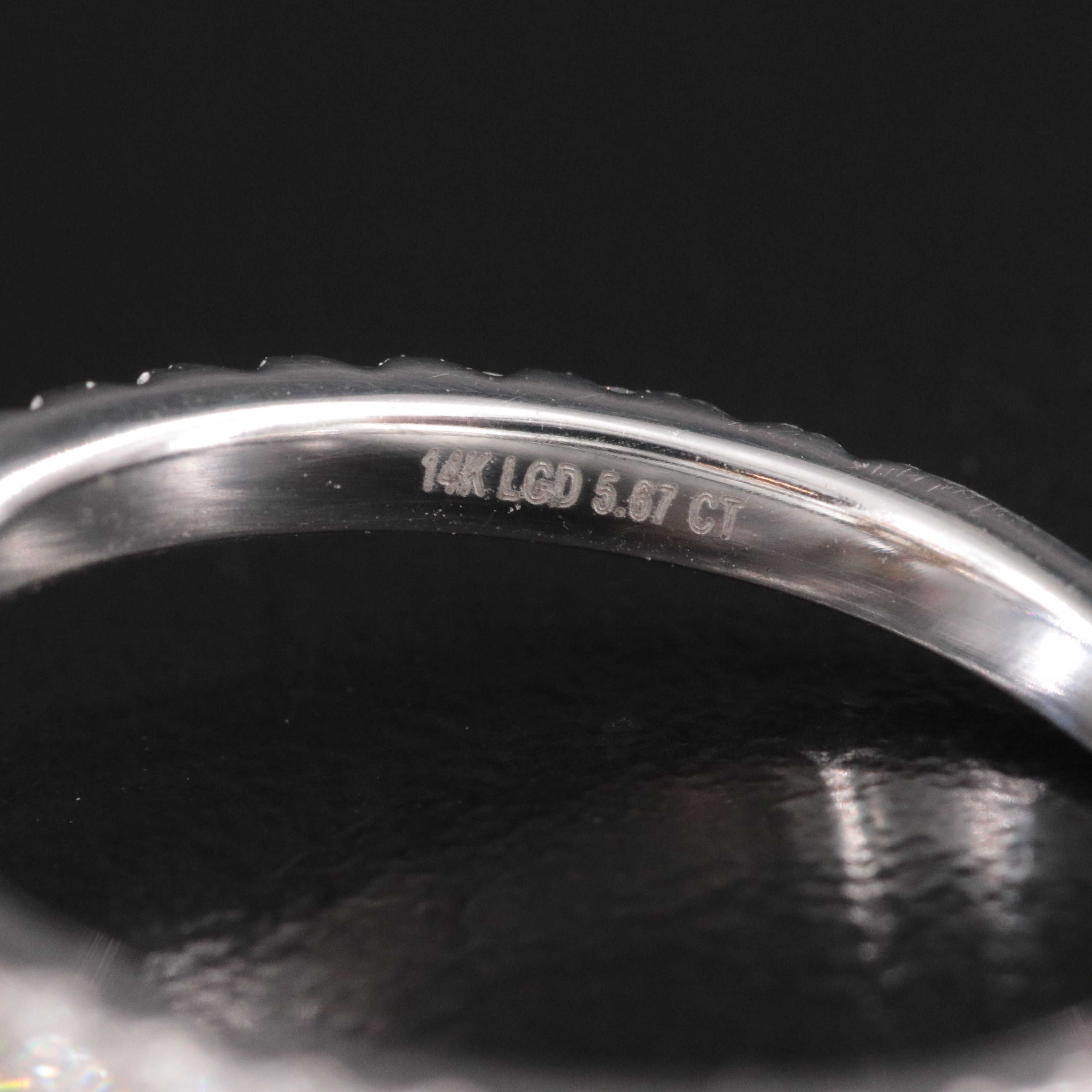 14K 5.15 CTW Lab Grown Diamond Ring with Fancy Yellow Center