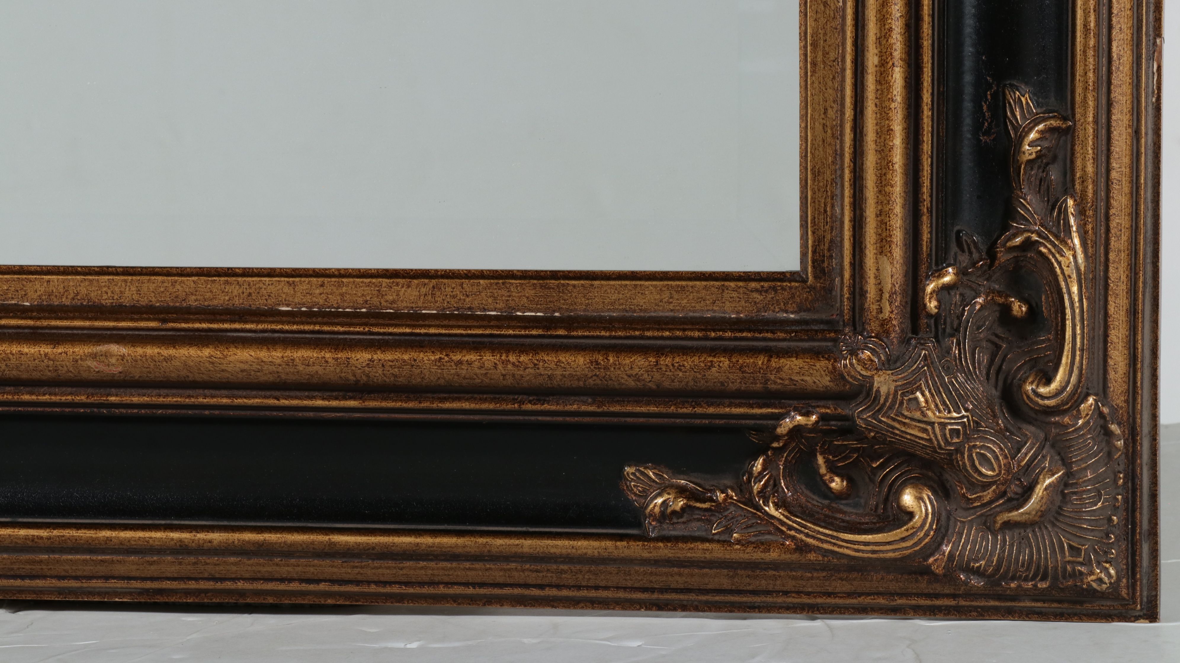 Louis XV Revival Gilt and Ebonized Wood Beveled Glass Wall Mirror