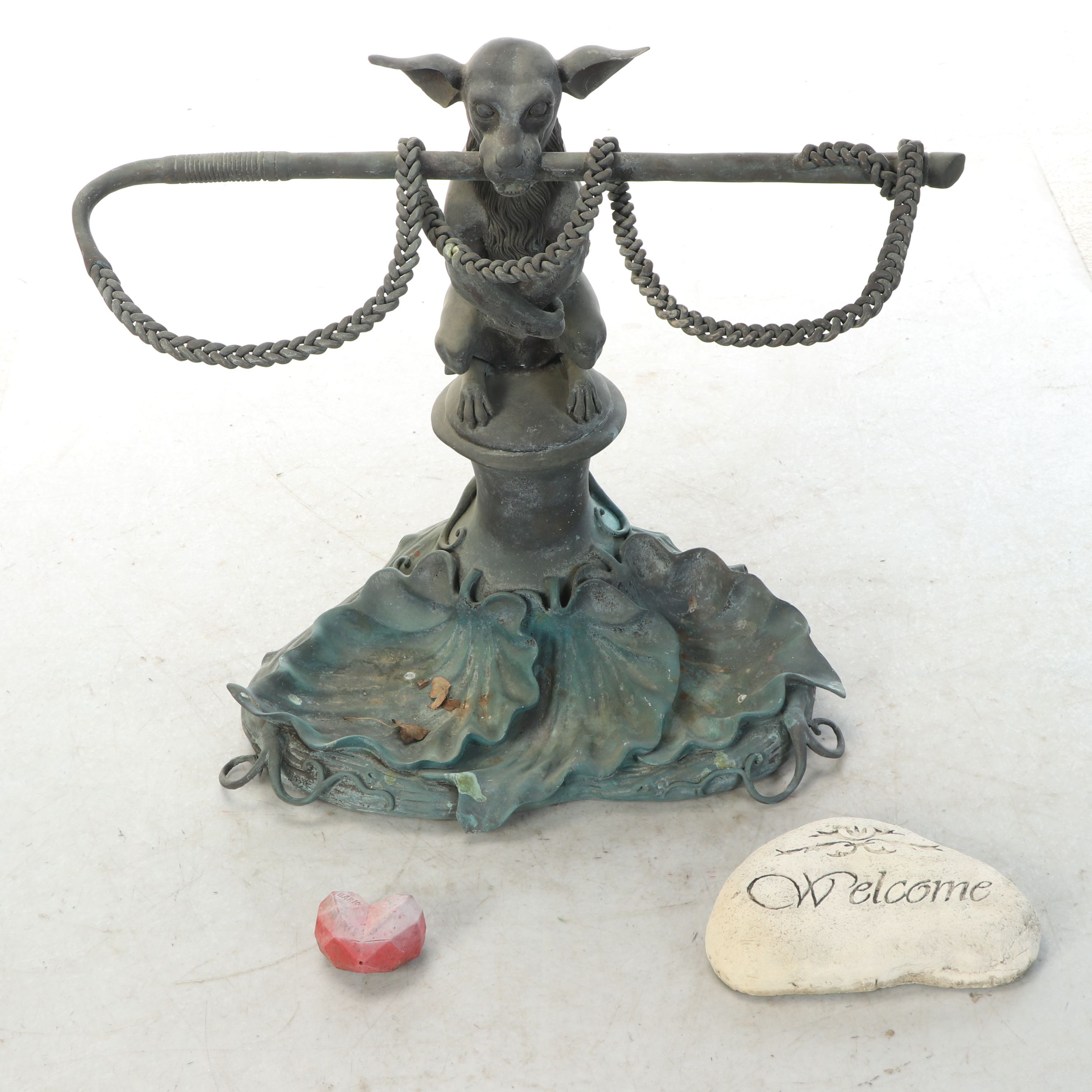 Dog with Stick Garden Statue with Decorative Stones