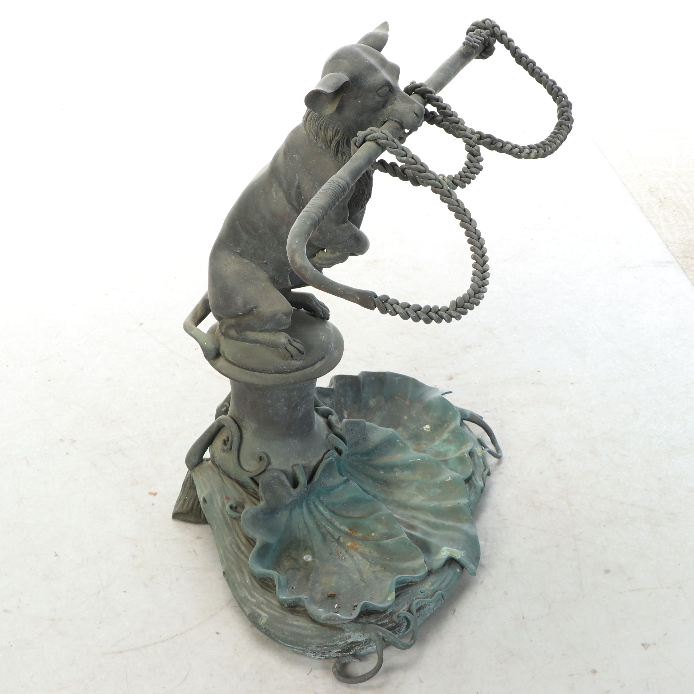 Dog with Stick Garden Statue with Decorative Stones