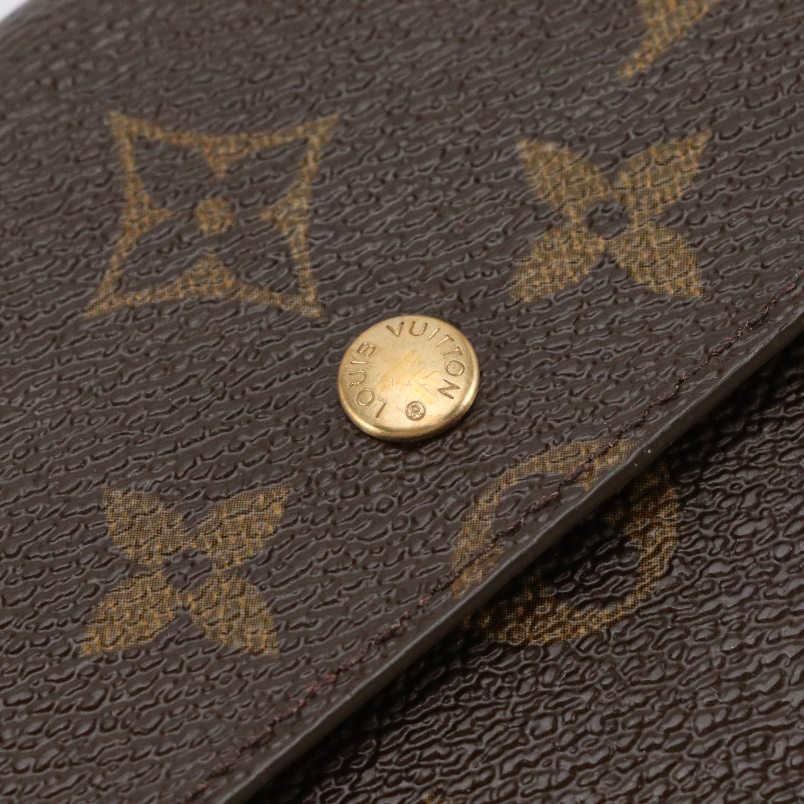 Louis Vuitton Porte-Trésor International in Monogram Canvas