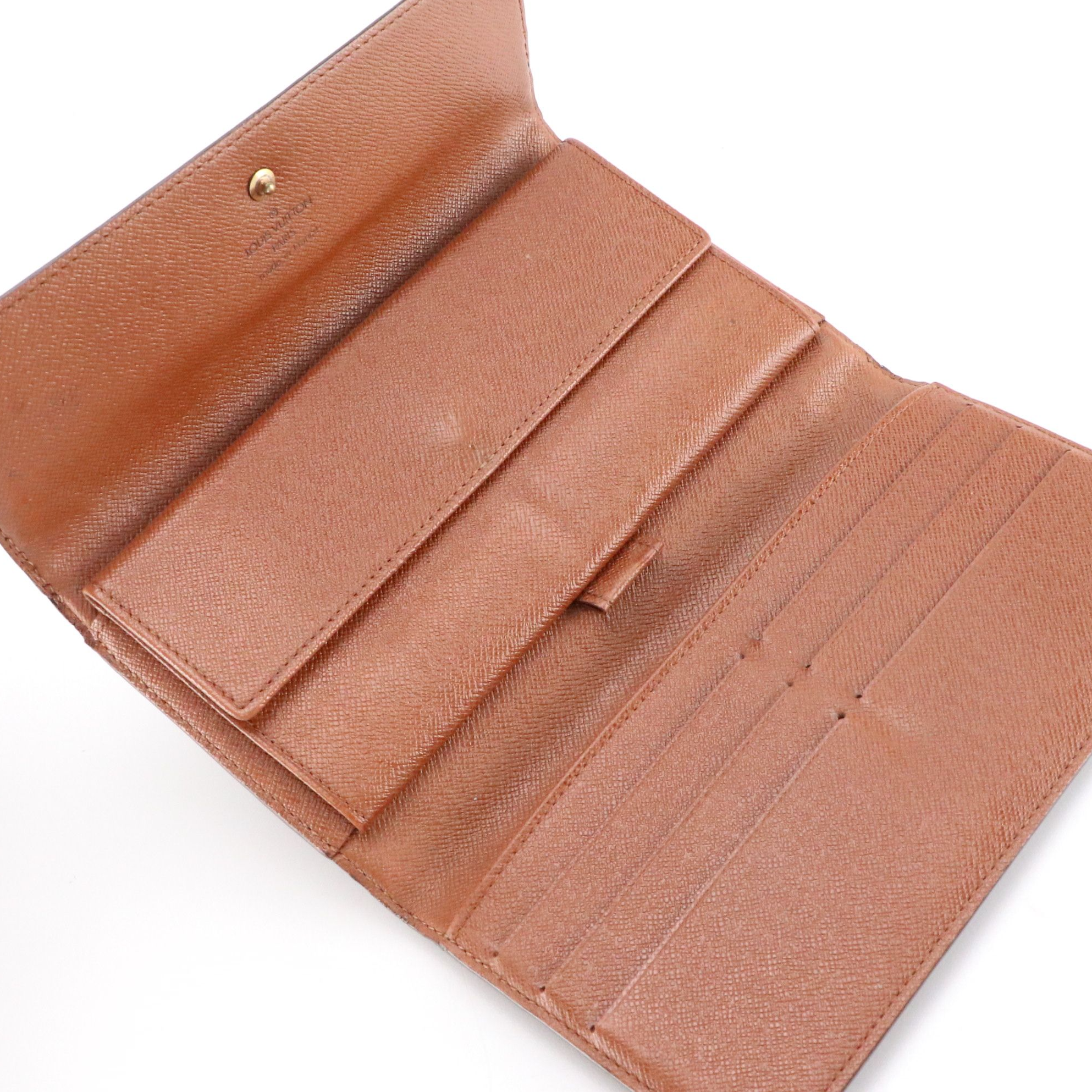 Louis Vuitton Porte-Trésor International in Monogram Canvas