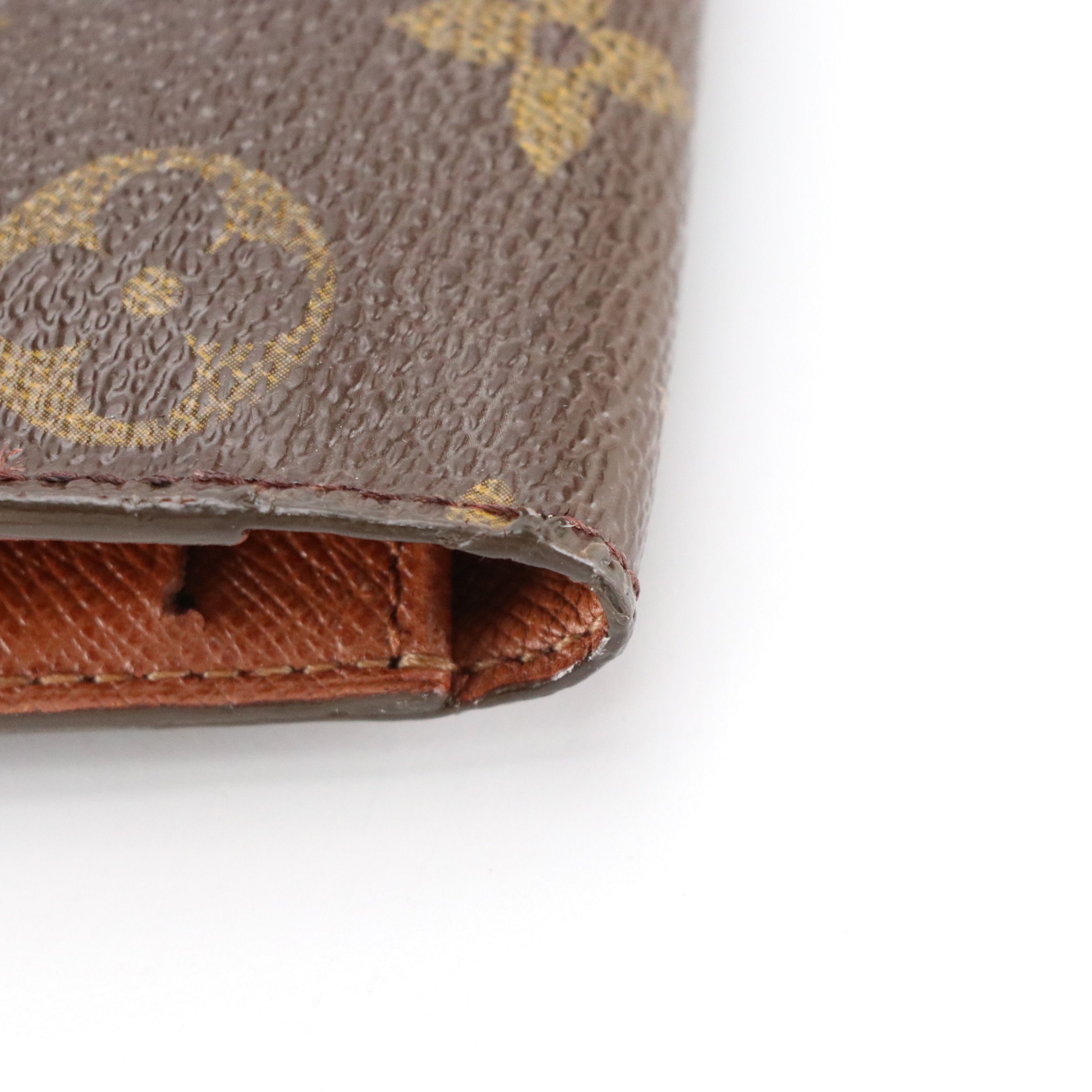 Louis Vuitton Porte-Trésor International in Monogram Canvas