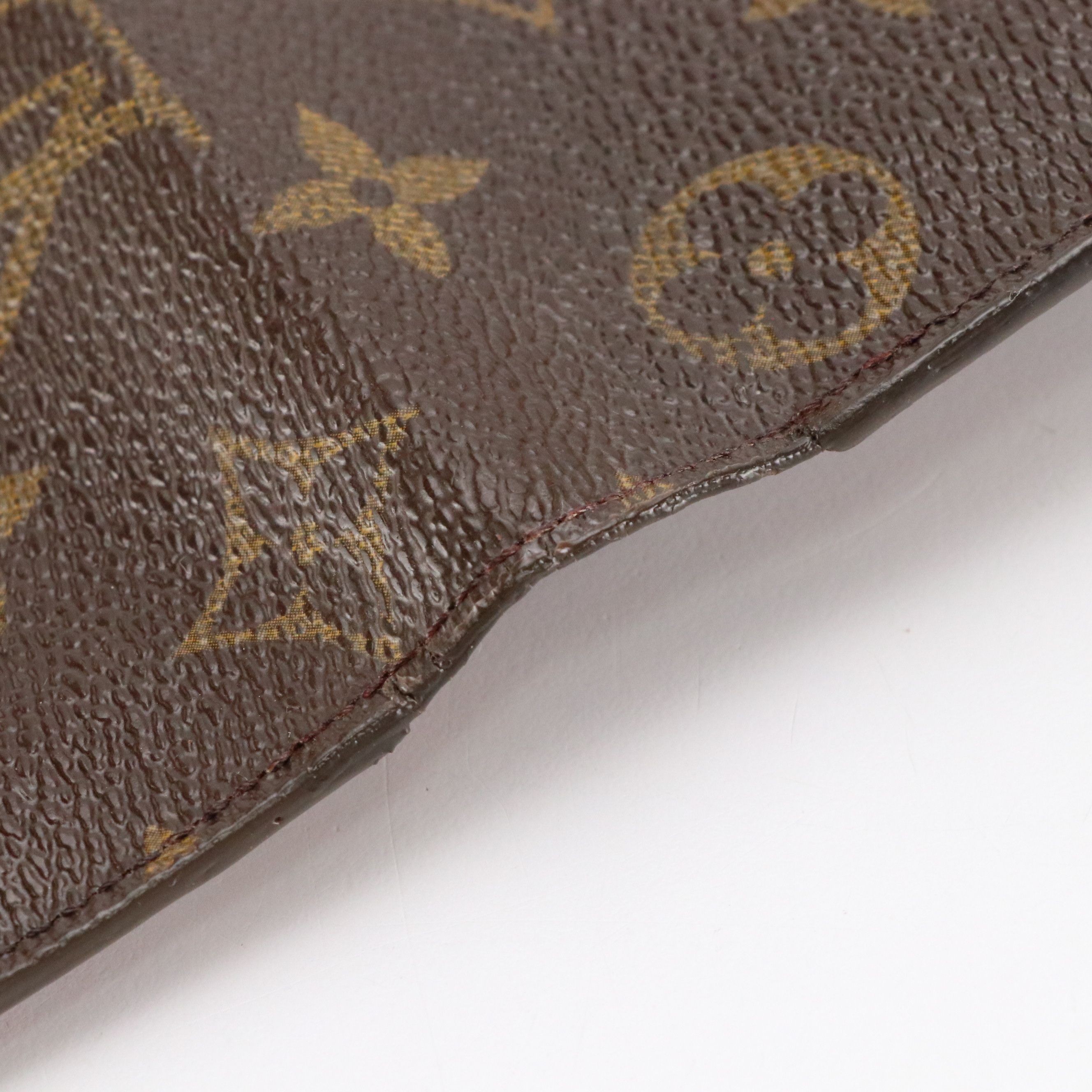 Louis Vuitton Porte-Trésor International in Monogram Canvas