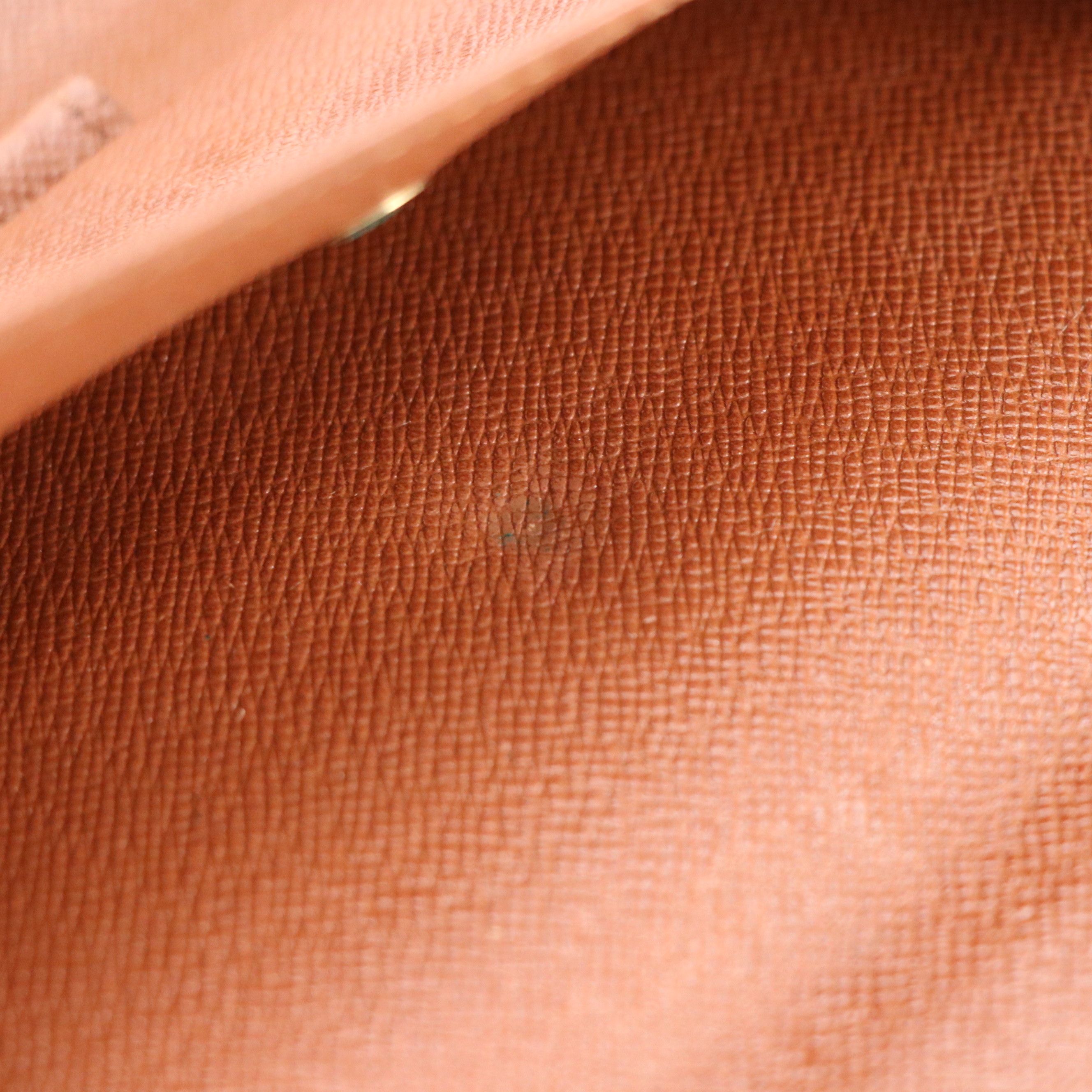 Louis Vuitton Porte-Trésor International in Monogram Canvas