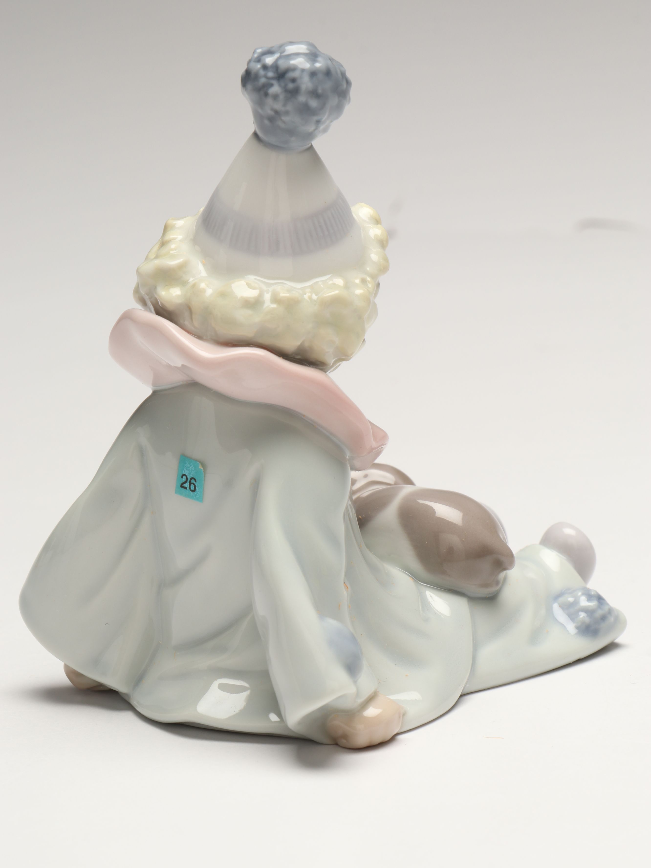 Lladró Clown with Puppy Porcelain Figures and Other Swaddled Baby Figure