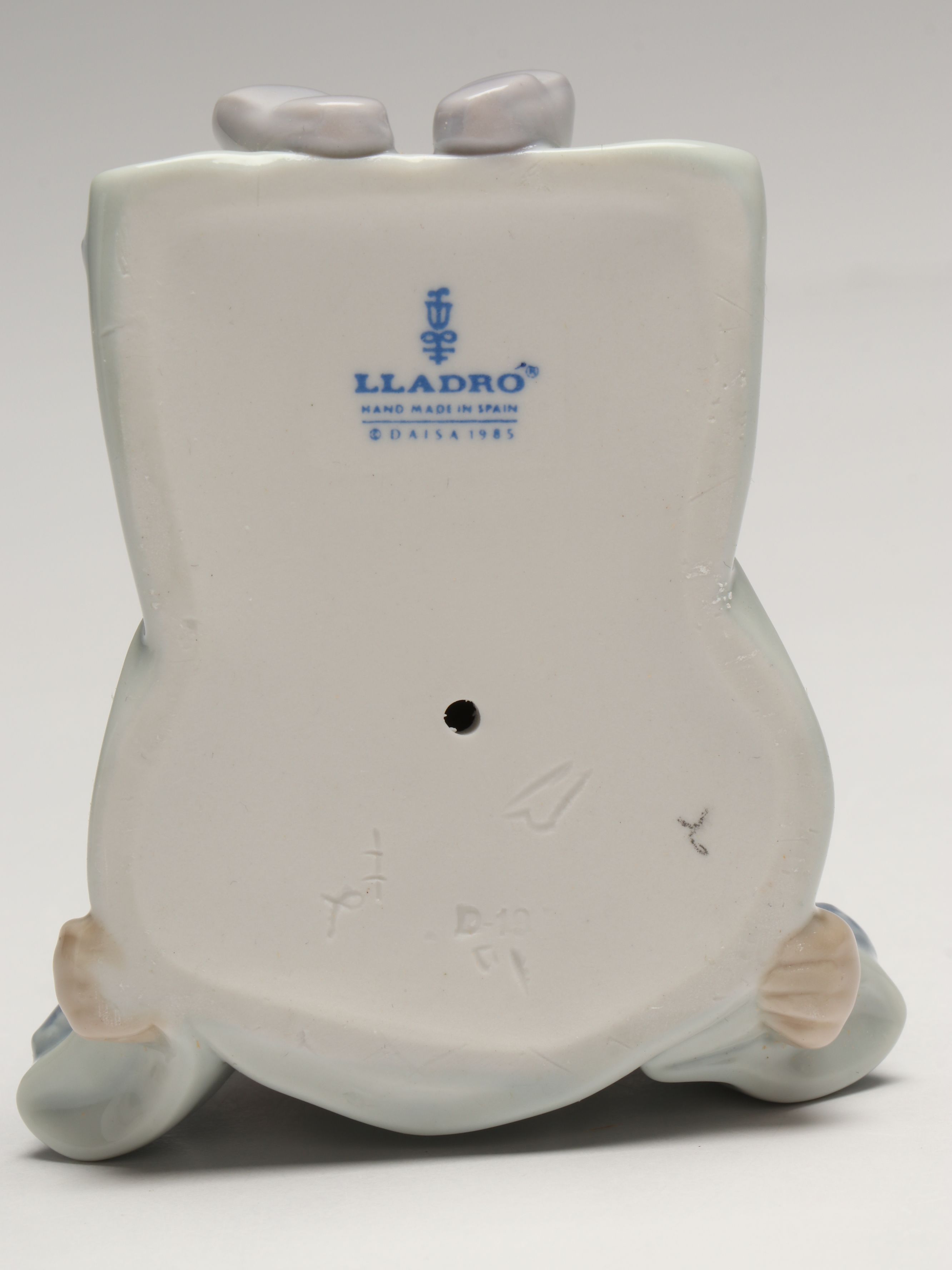 Lladró Clown with Puppy Porcelain Figures and Other Swaddled Baby Figure