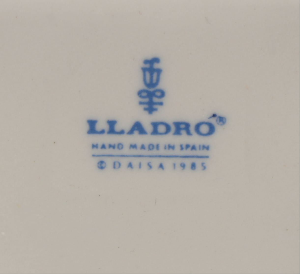 Lladró Clown with Puppy Porcelain Figures and Other Swaddled Baby Figure