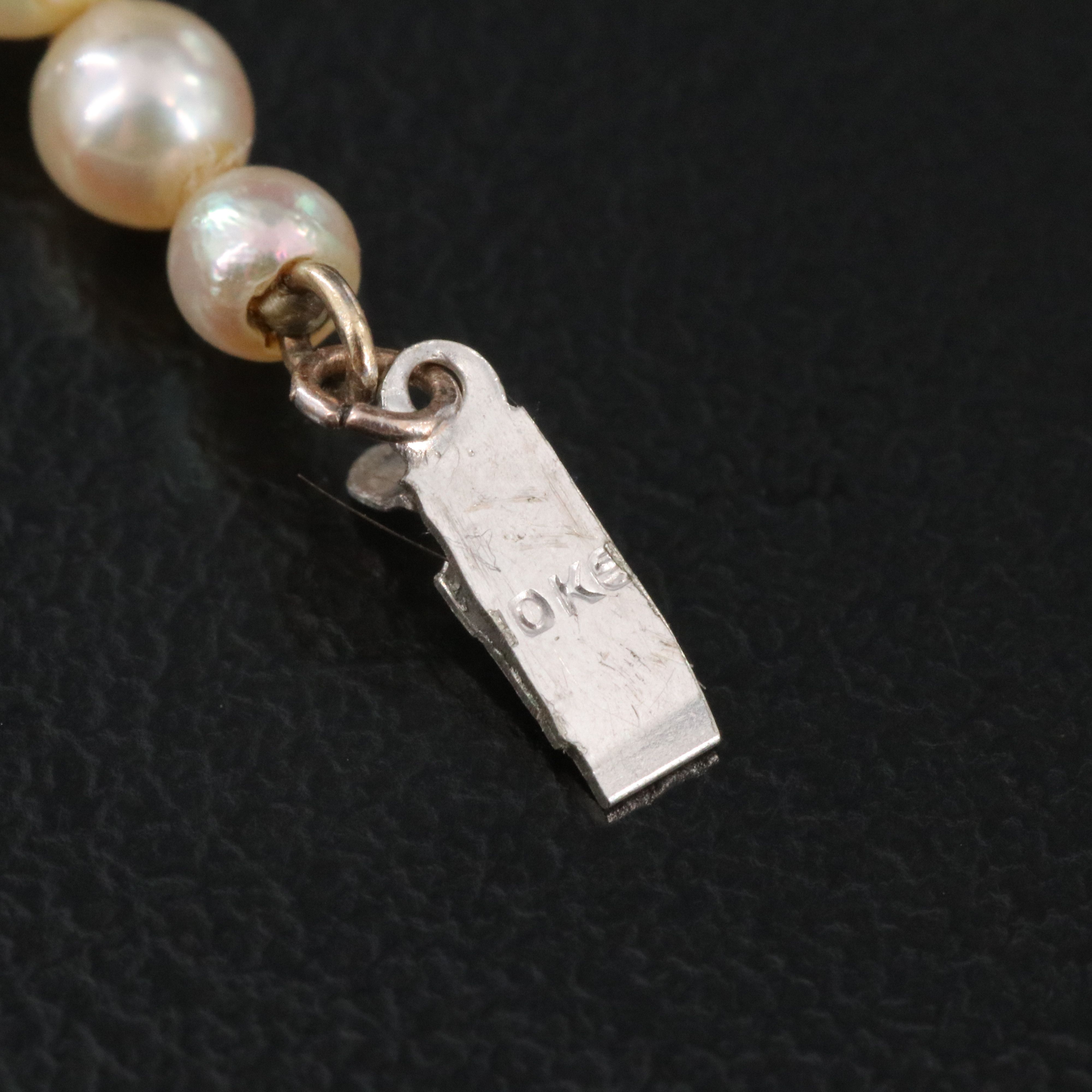 Graduated Pearl Necklace with Antique Platinum Diamond Clasp and GIA Report