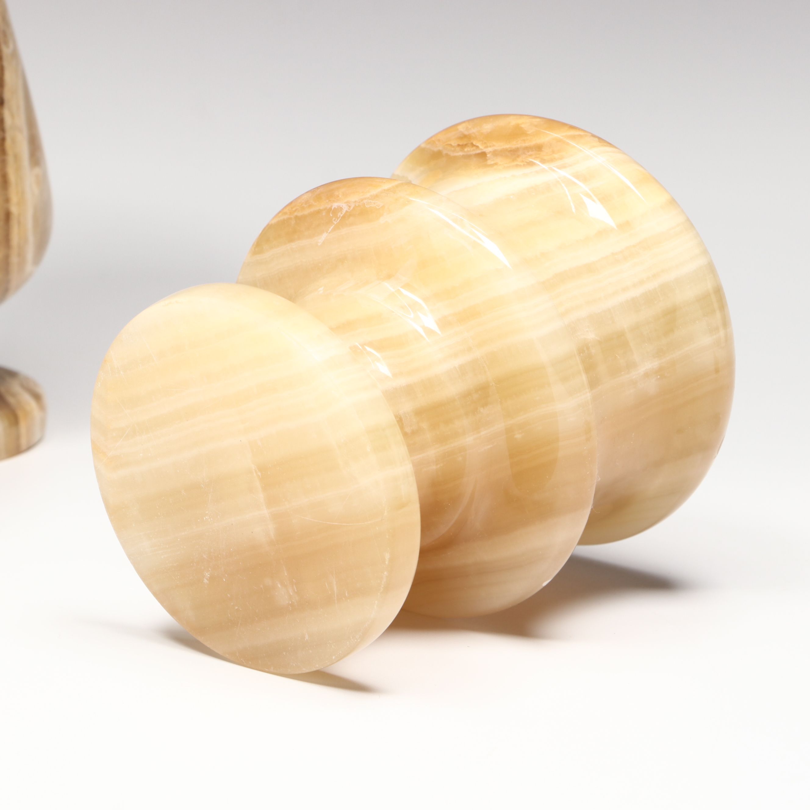 Banded Calcite and White Marble Mortar and Pestles with Banded Calcite Vase