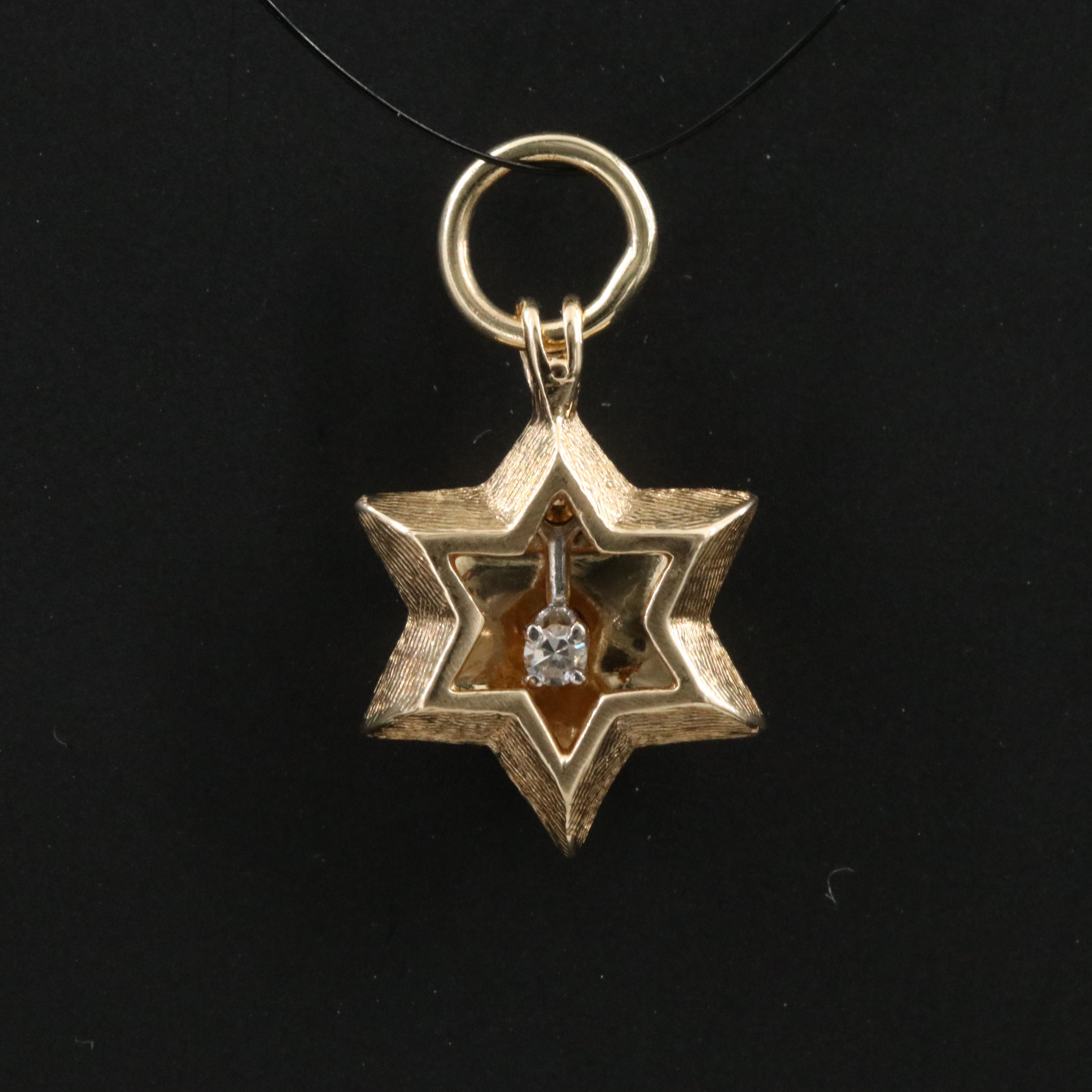 14K 0.04 CT Diamond Articulated Star of David Pendant