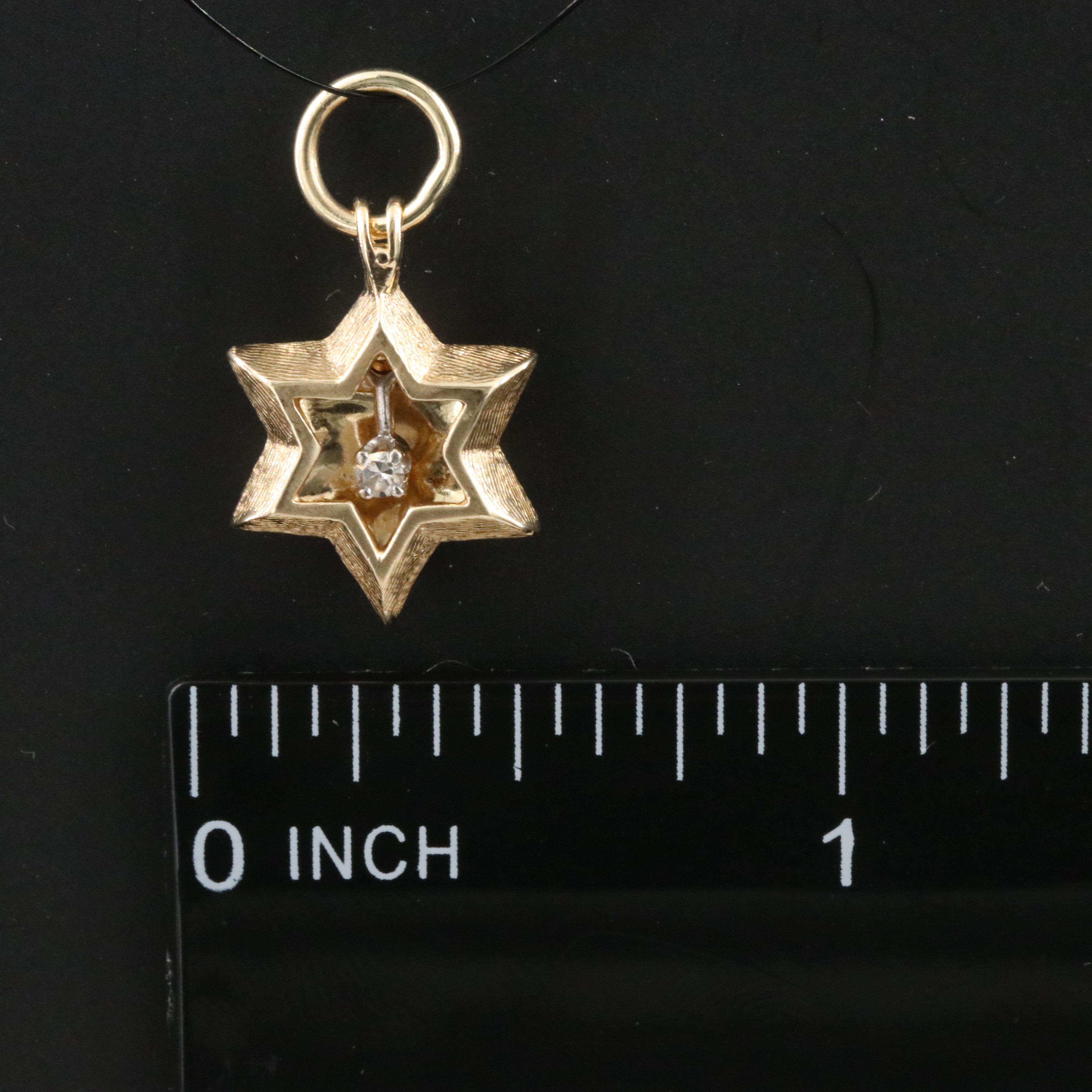 14K 0.04 CT Diamond Articulated Star of David Pendant