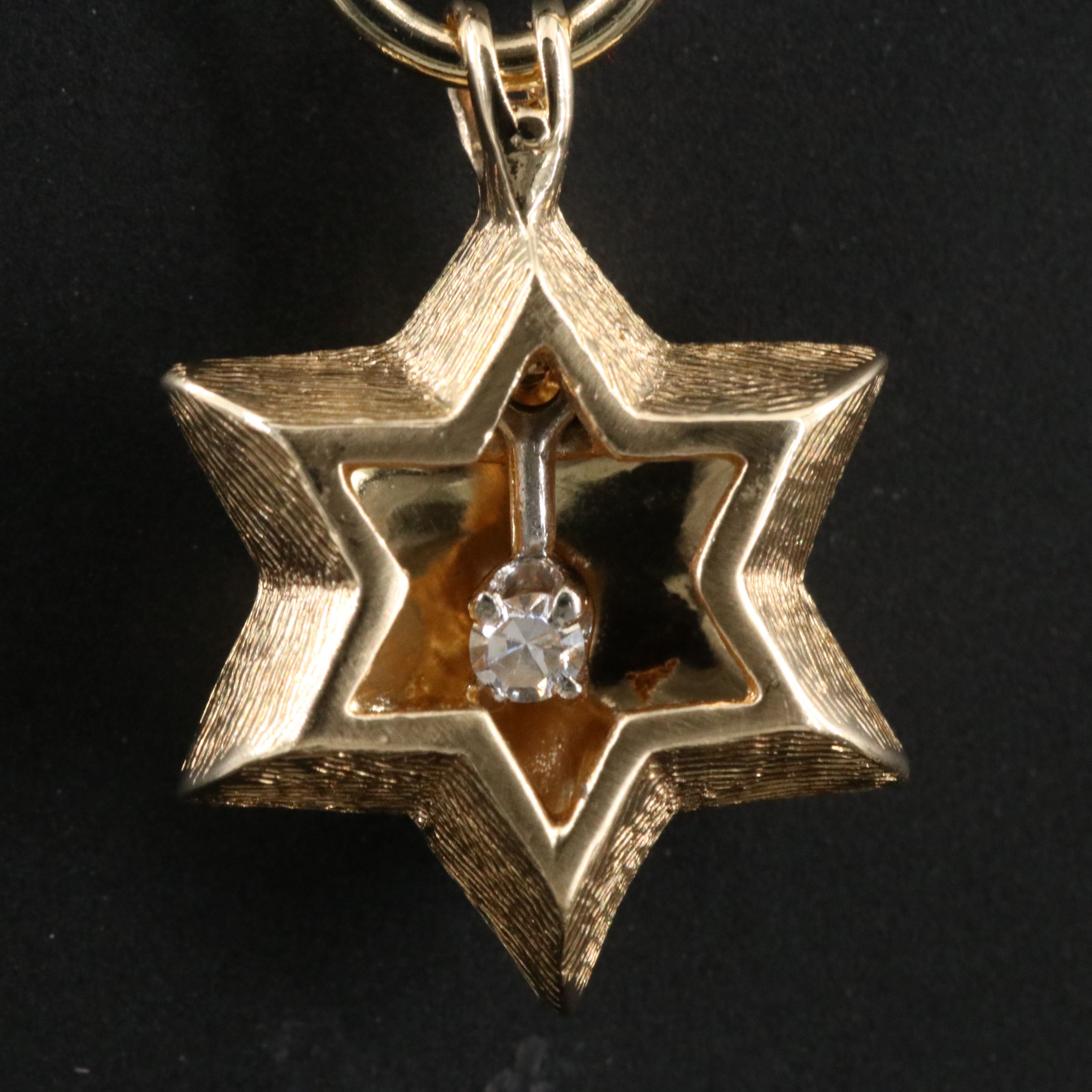 14K 0.04 CT Diamond Articulated Star of David Pendant
