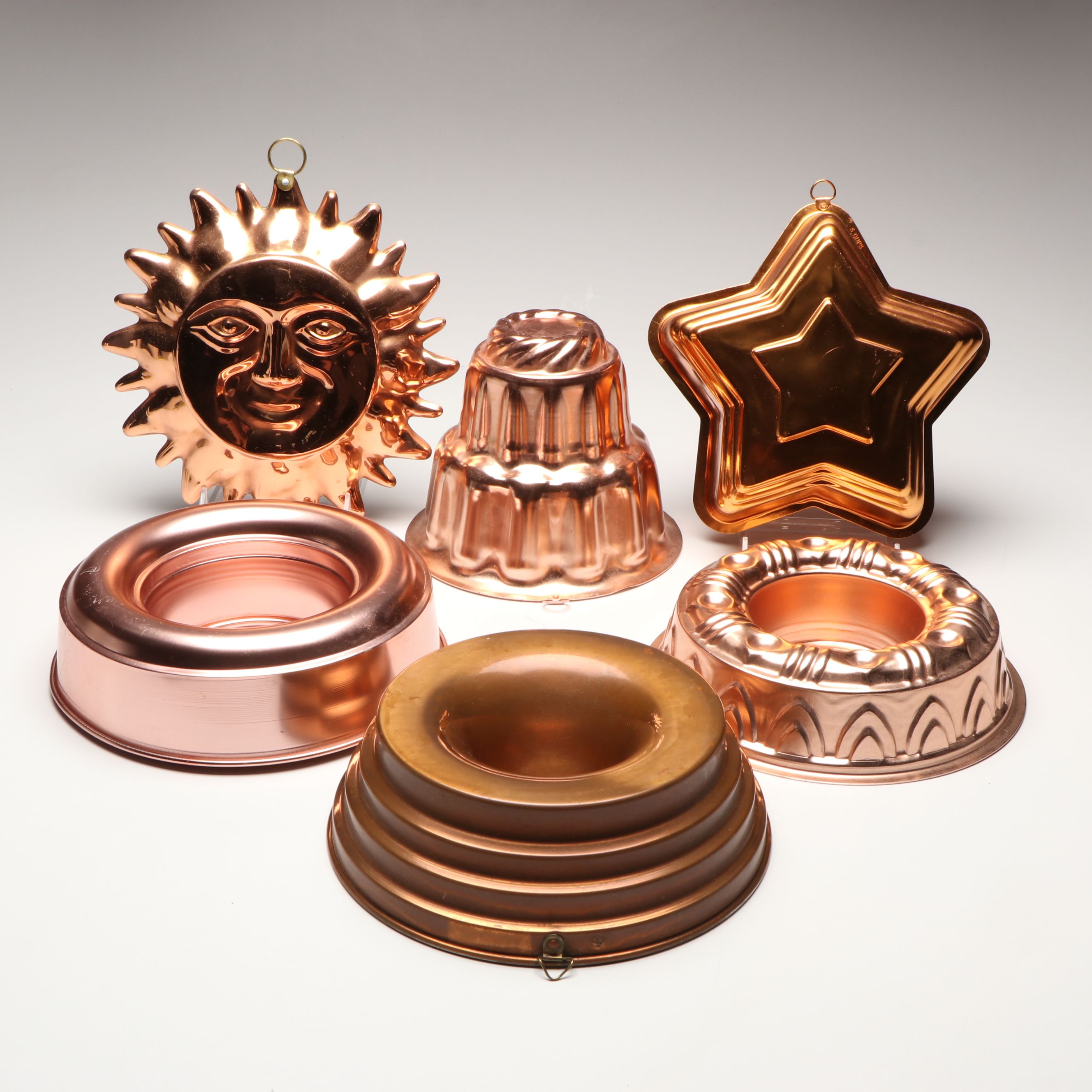 Copper Tone Sun Wall Hanging with Star and Other Metal Jell-O and Baking Molds