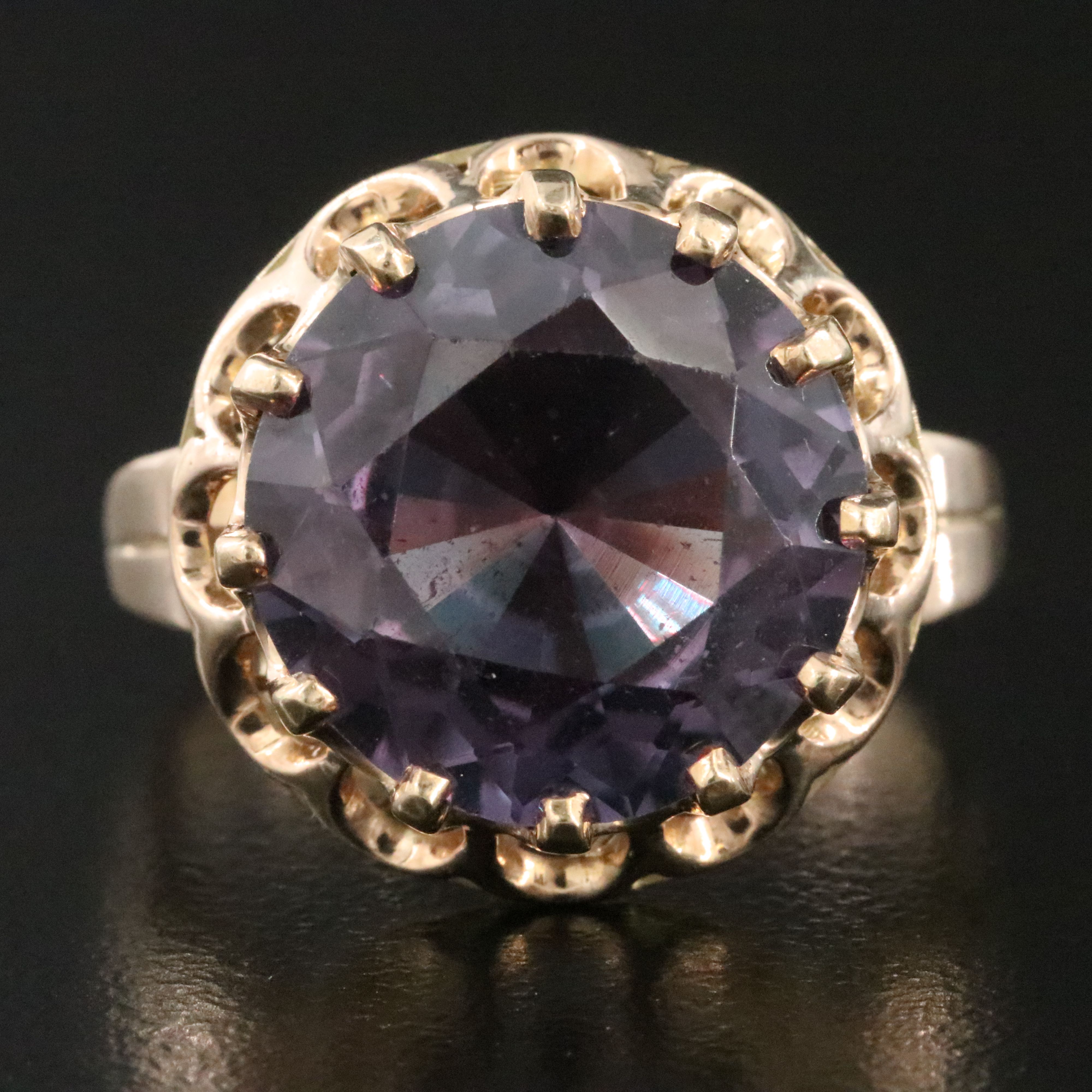 10K Color Change Sapphire Ring with a Scroll Setting