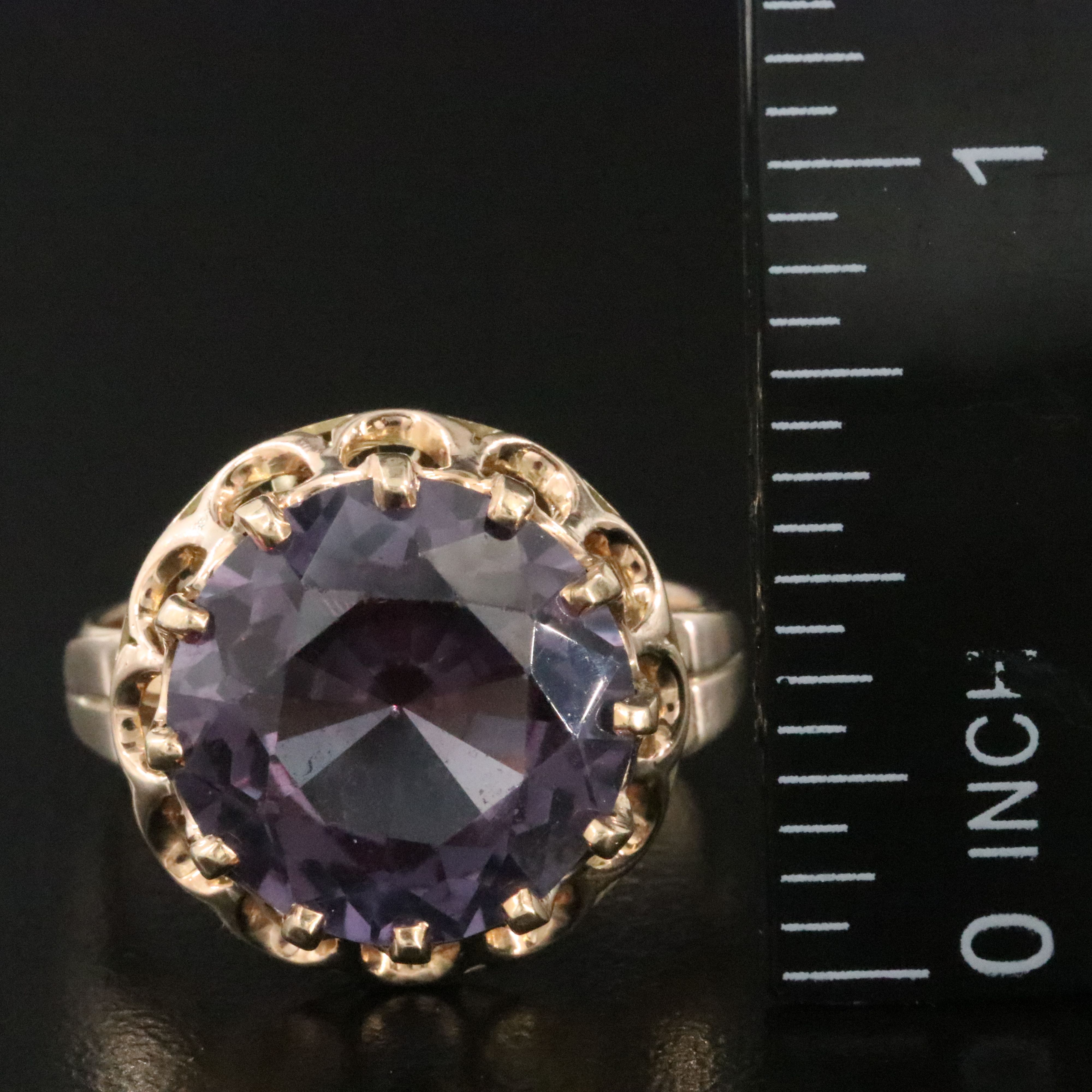 10K Color Change Sapphire Ring with a Scroll Setting