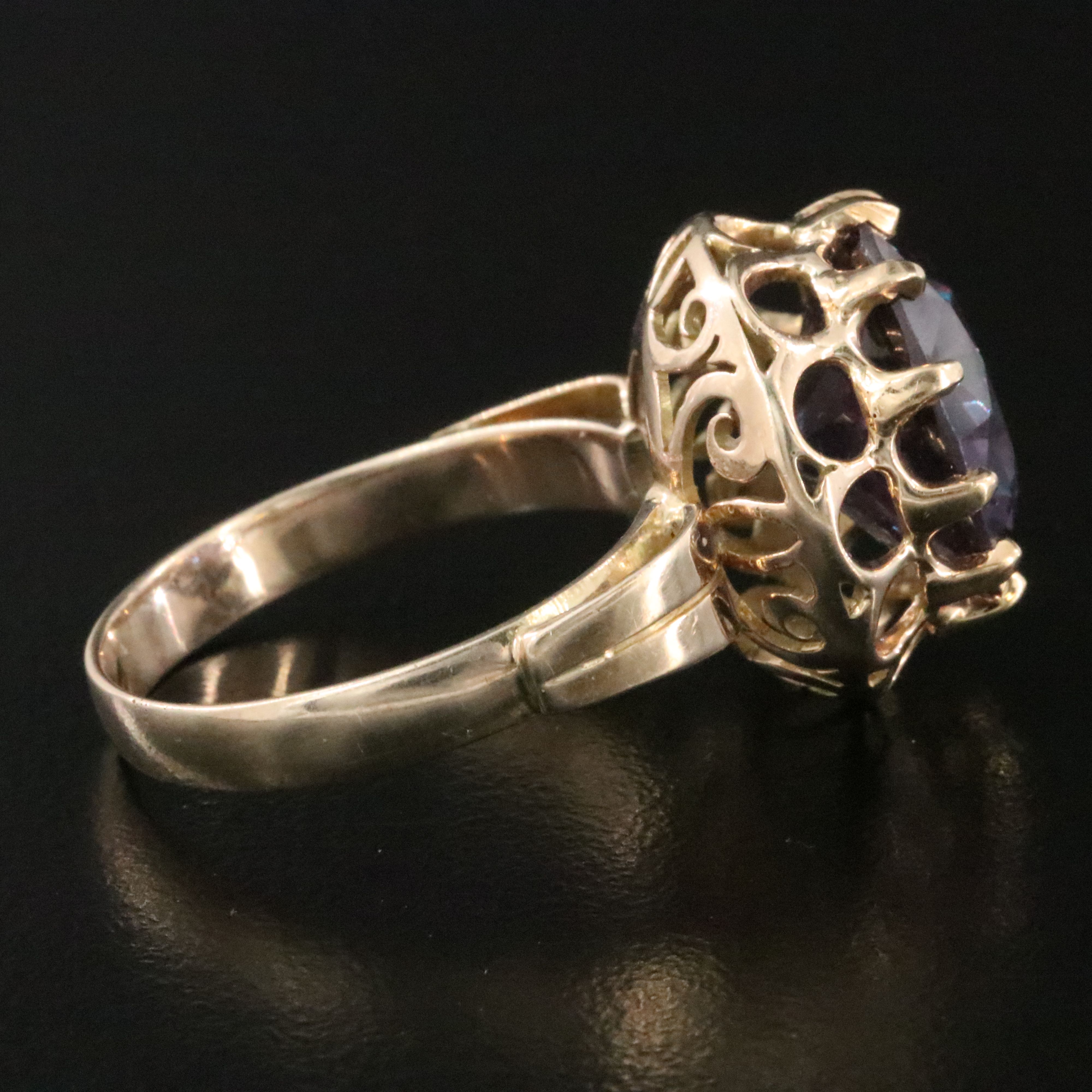 10K Color Change Sapphire Ring with a Scroll Setting