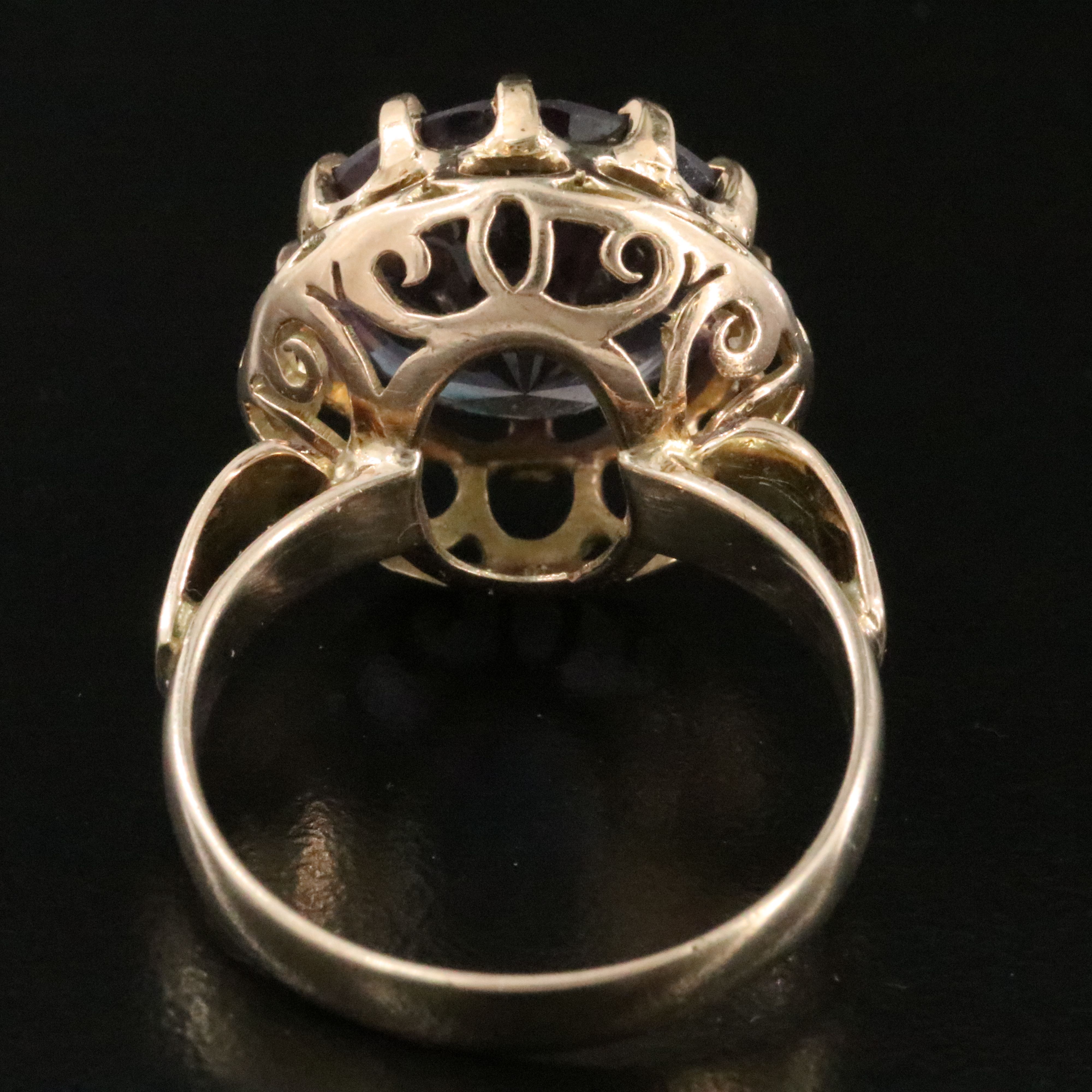 10K Color Change Sapphire Ring with a Scroll Setting