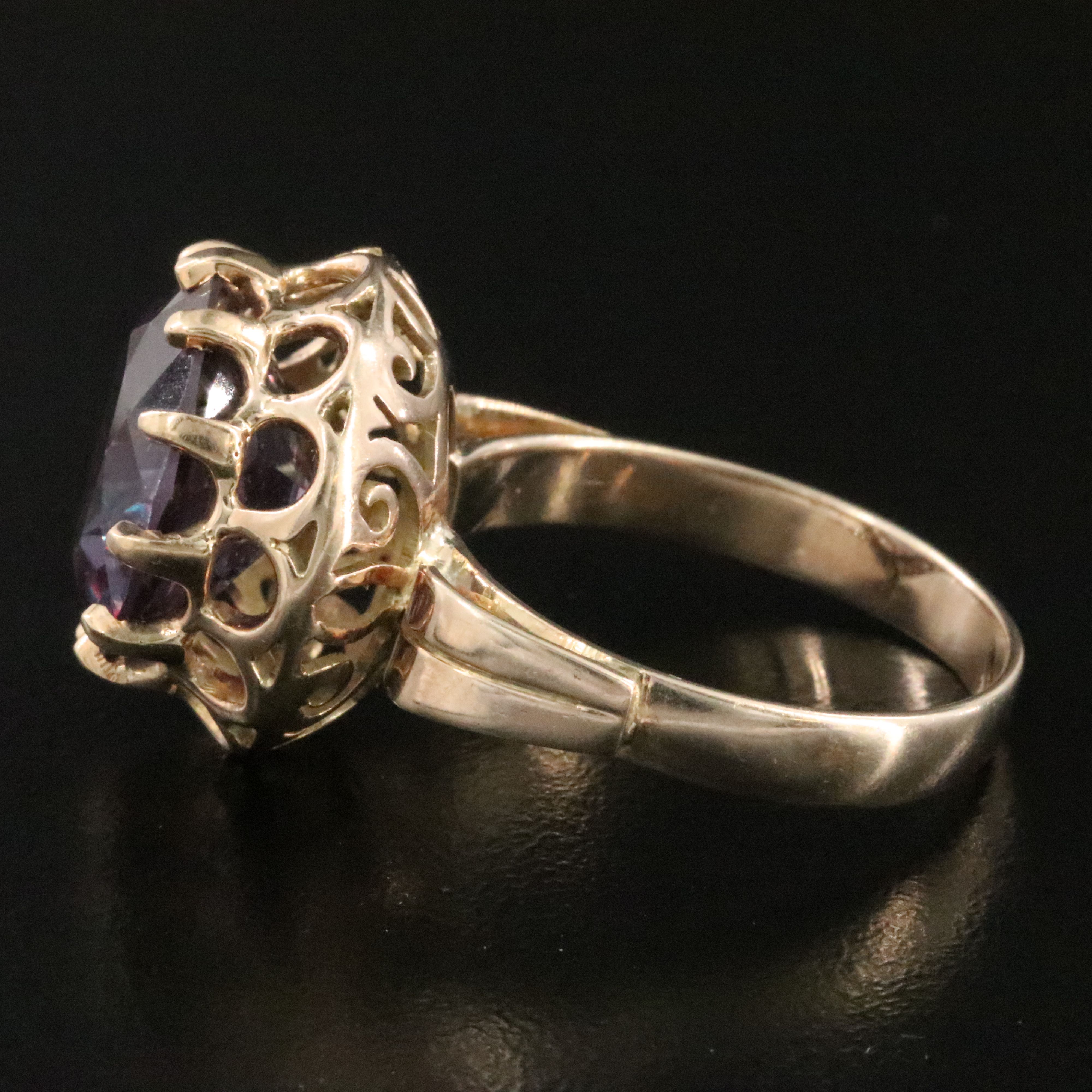 10K Color Change Sapphire Ring with a Scroll Setting