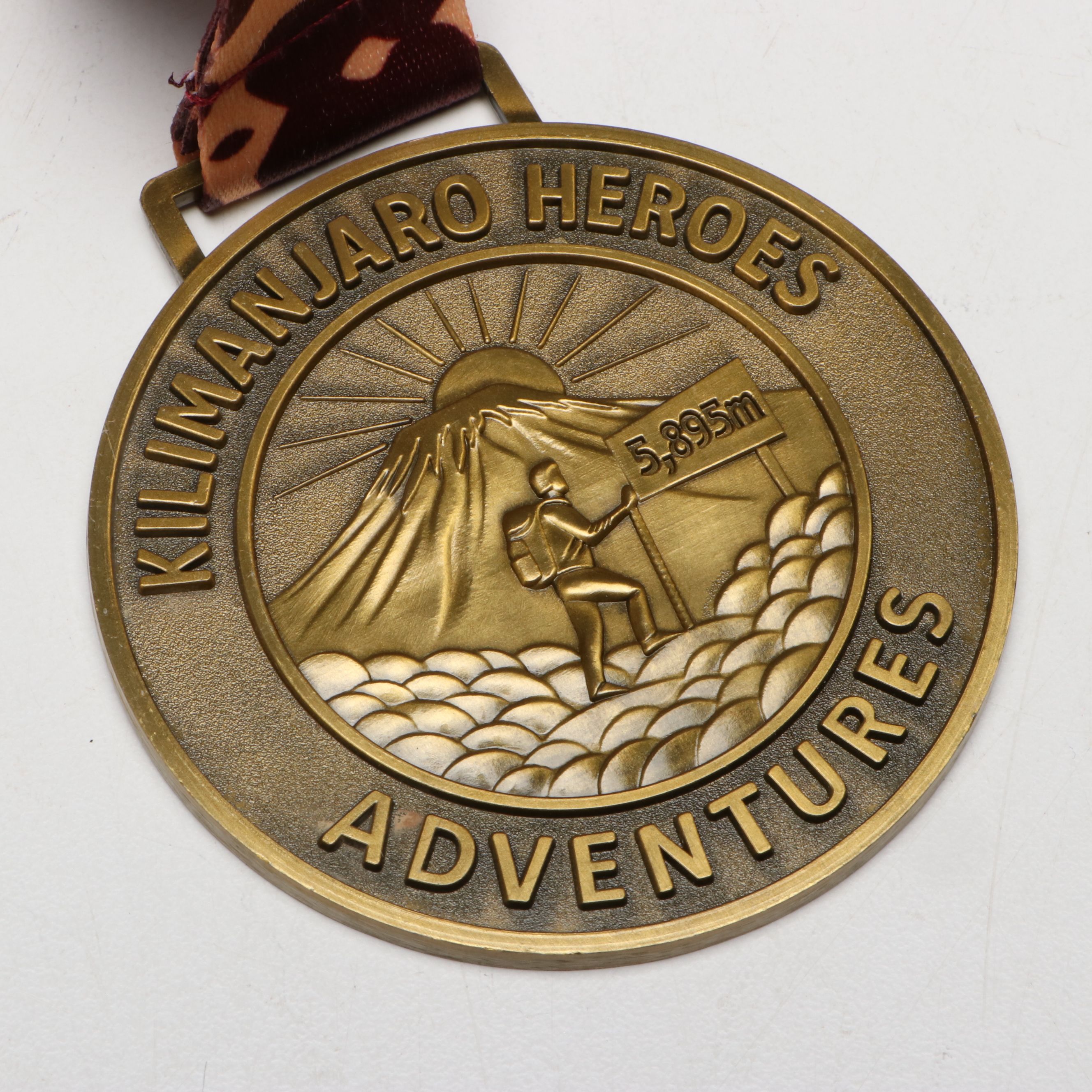 Pentax Super Program Camera and Mt. Kilimanjaro Medal in Blue River Fly Shop Box