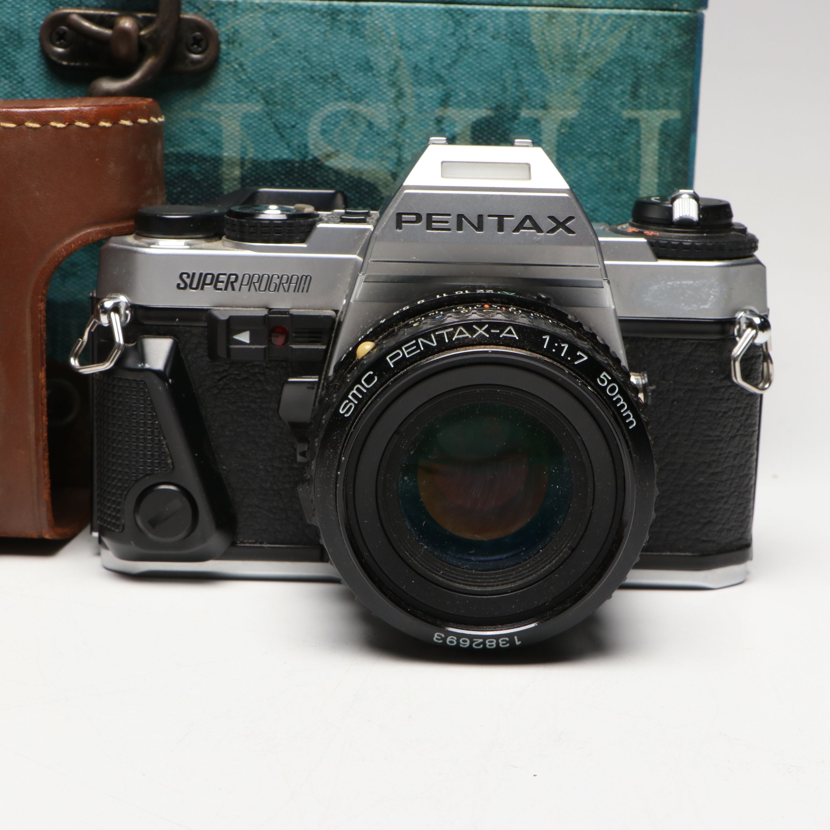 Pentax Super Program Camera and Mt. Kilimanjaro Medal in Blue River Fly Shop Box