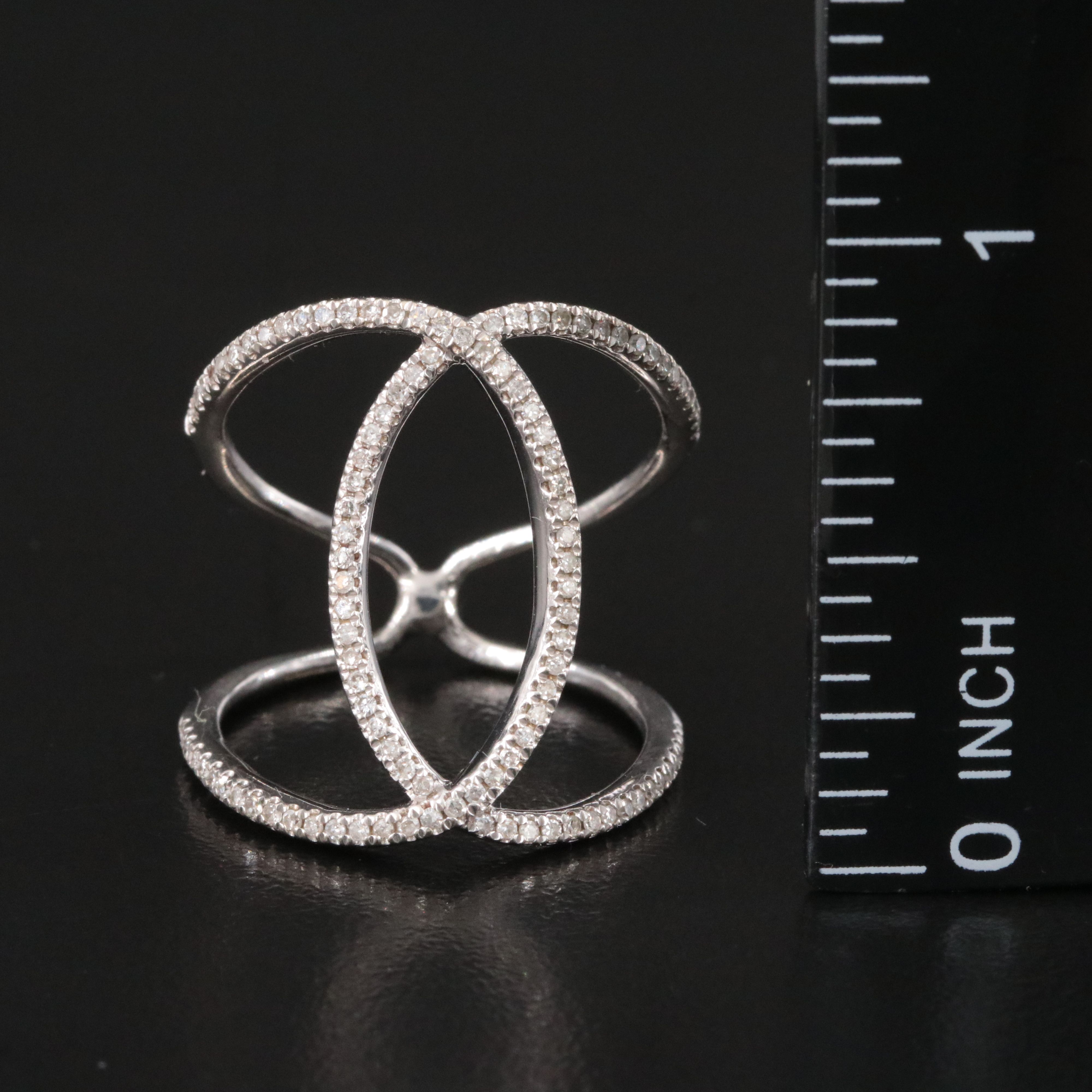 14K 0.25 CTW Diamond Interlocked Ring