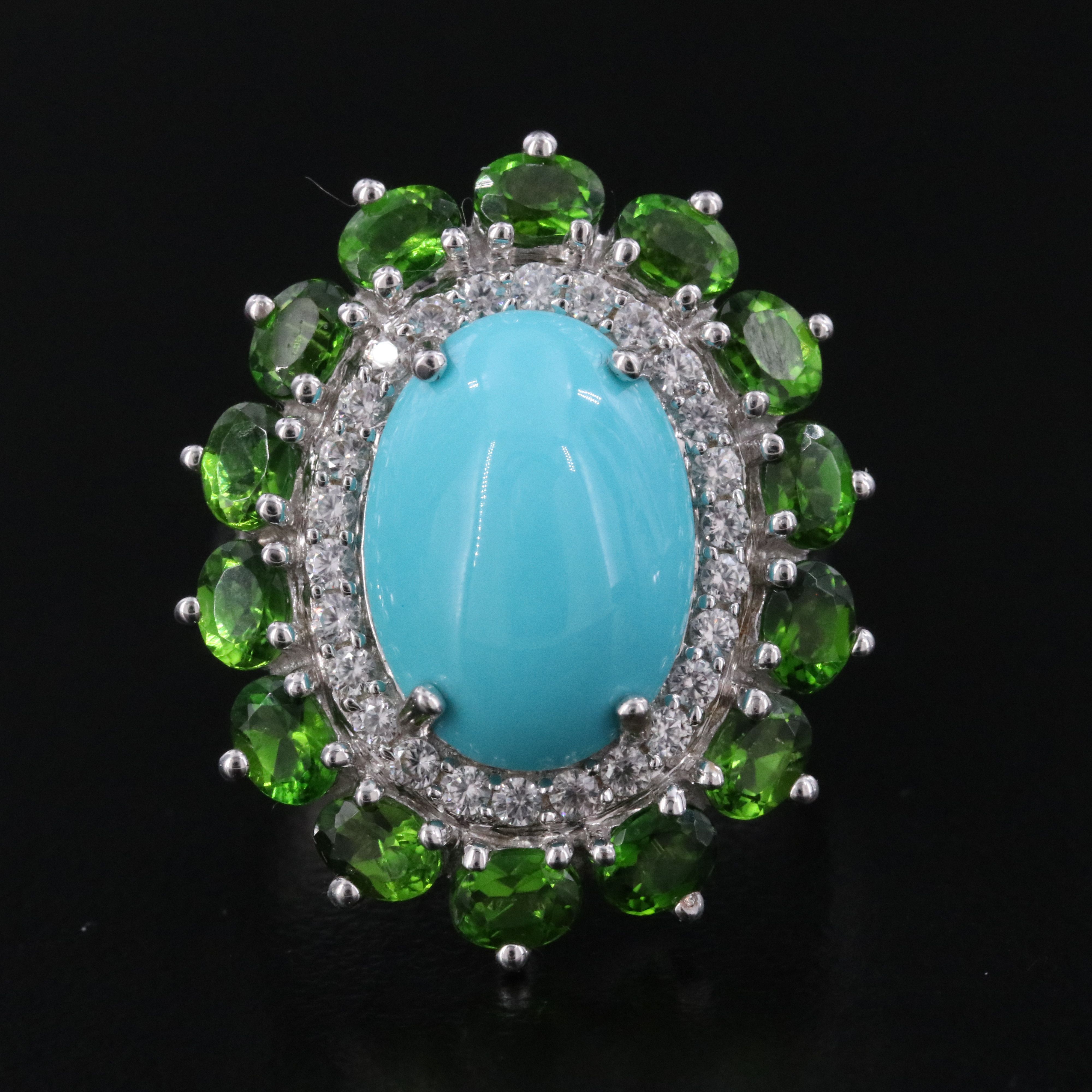 Sterling Turquoise, White Topaz, and Garnet Halo Ring