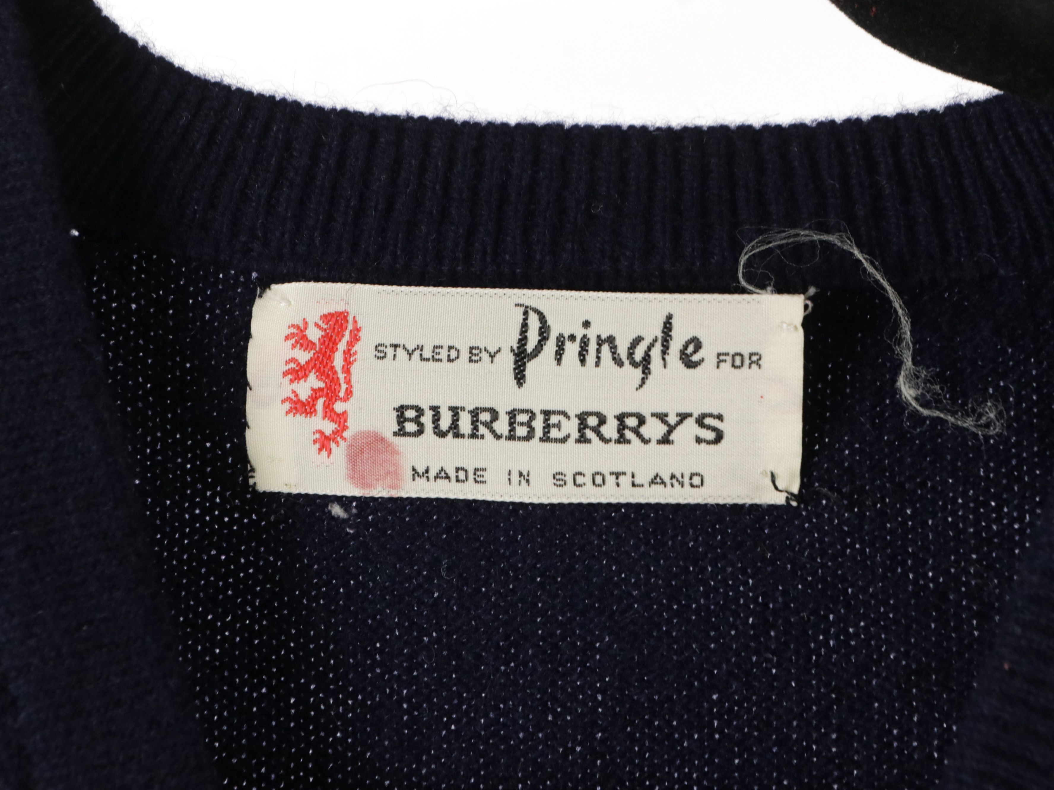 Burberrys, Pogue's, Brooks Brothers, and Tricots St. Raphael Sweaters