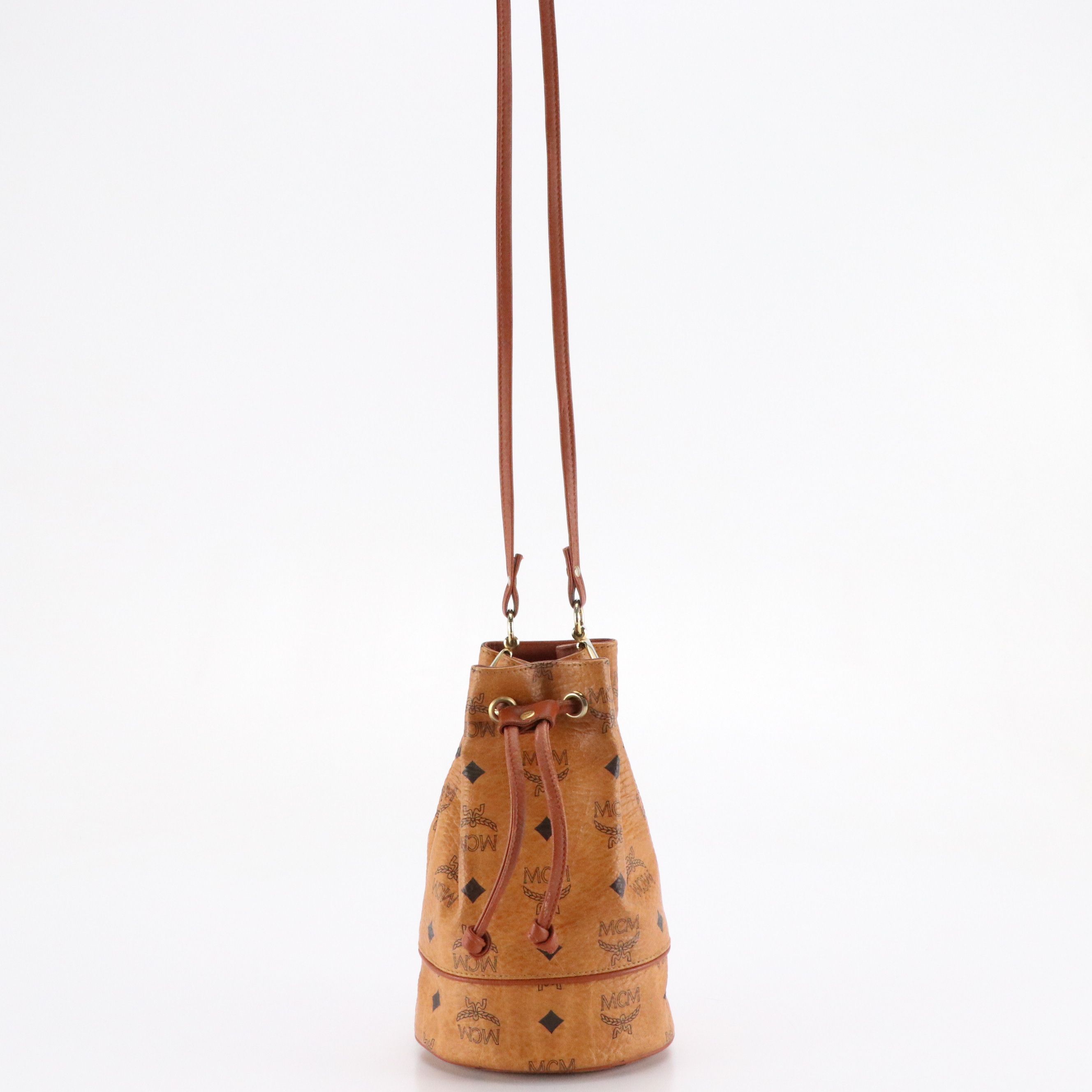MCM Mini Drawstring Bucket Bag in Cognac Visetos Canvas