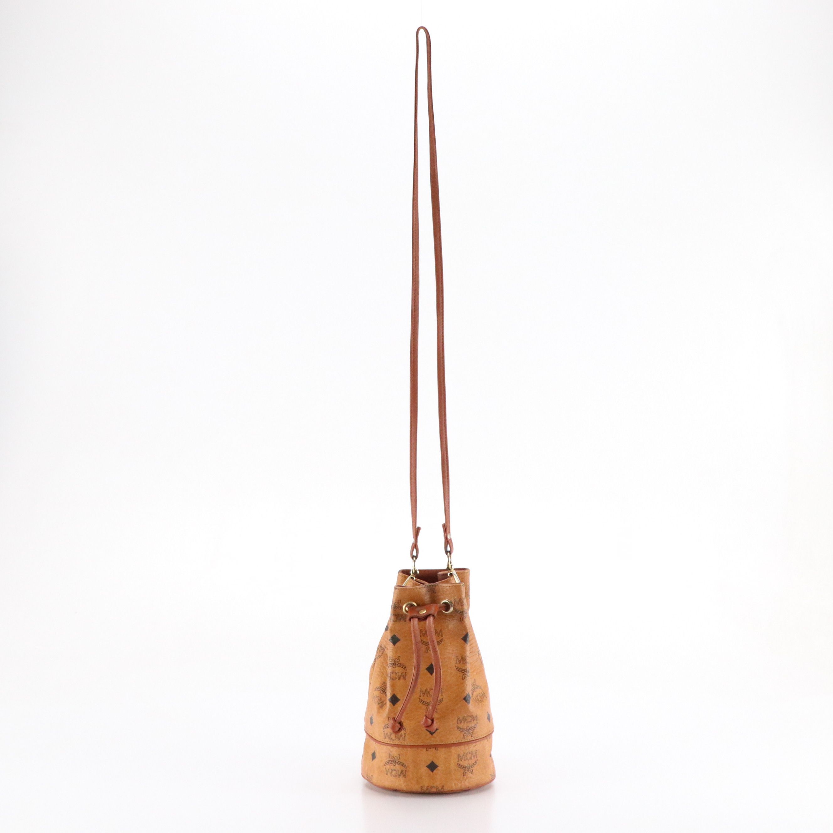 MCM Mini Drawstring Bucket Bag in Cognac Visetos Canvas
