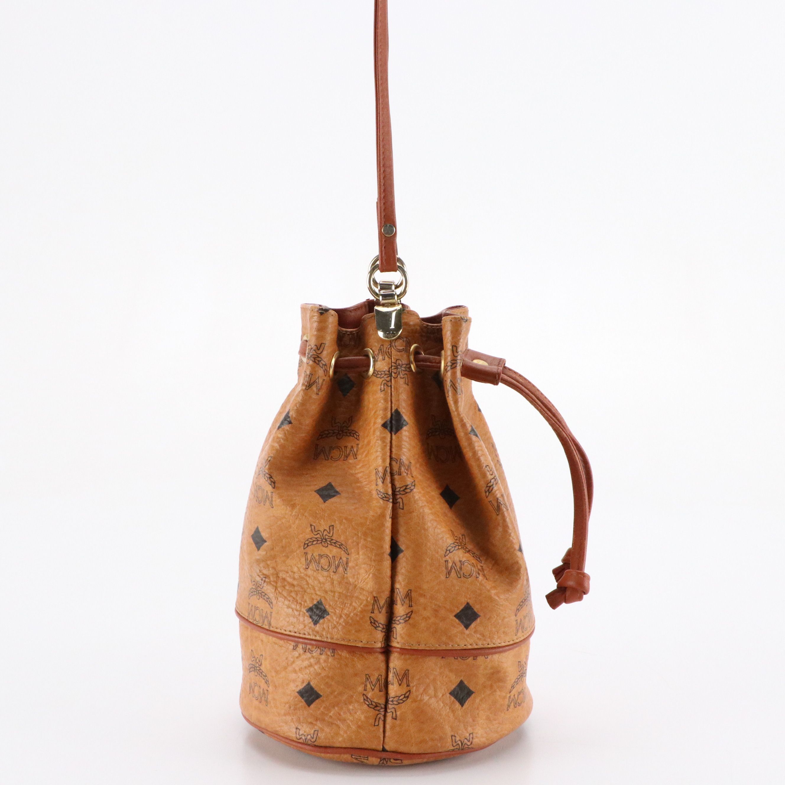 MCM Mini Drawstring Bucket Bag in Cognac Visetos Canvas