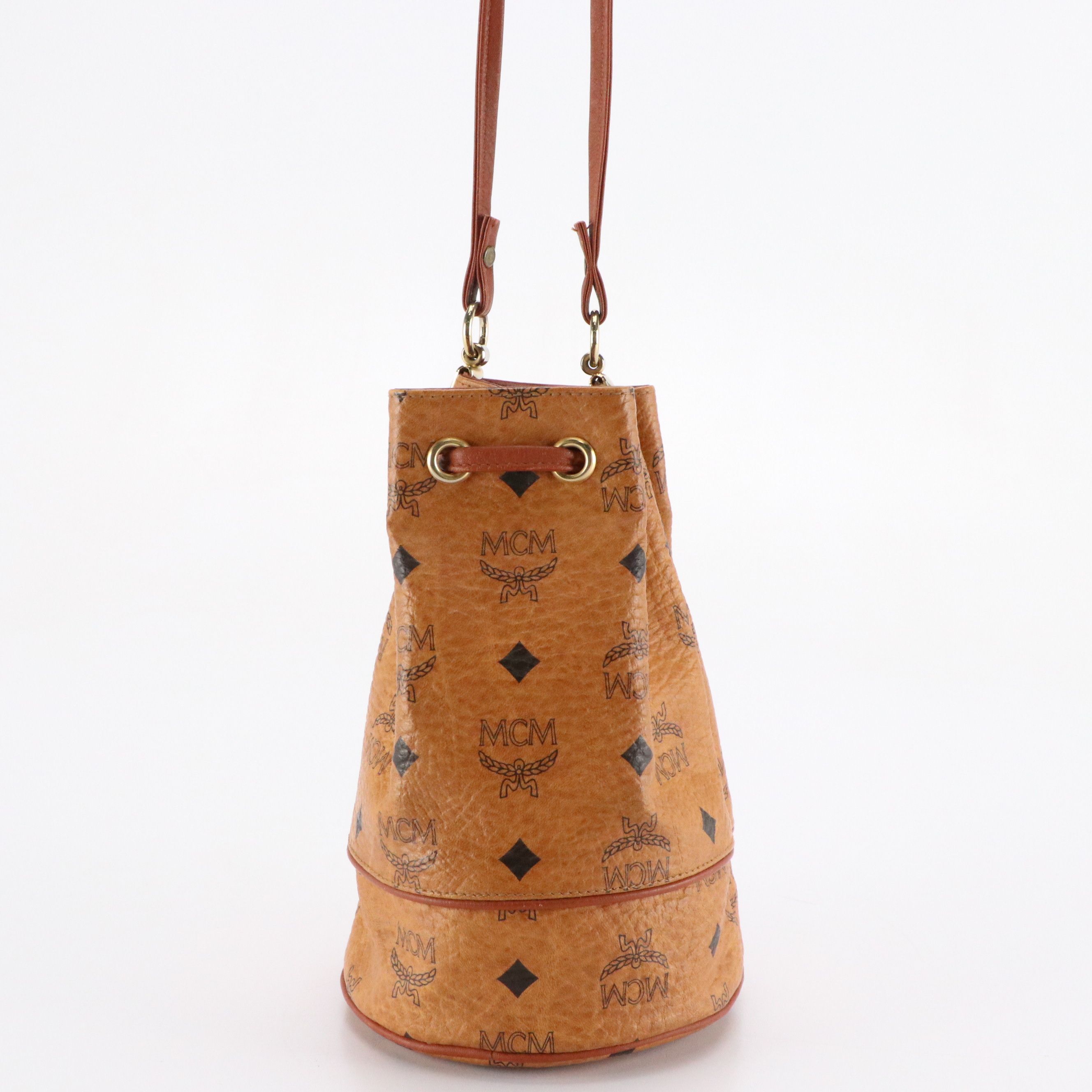 MCM Mini Drawstring Bucket Bag in Cognac Visetos Canvas