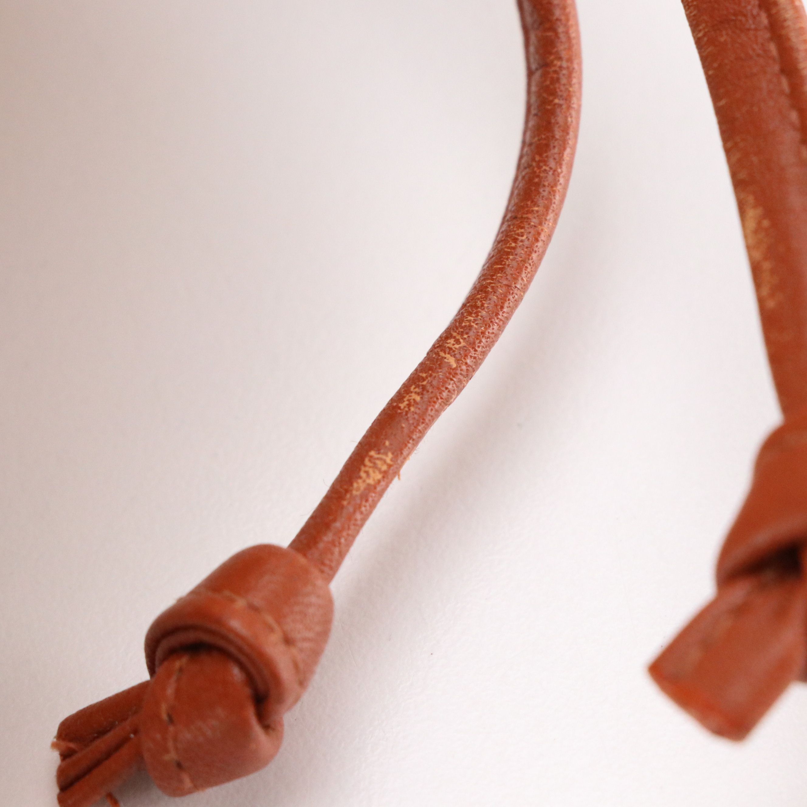 MCM Mini Drawstring Bucket Bag in Cognac Visetos Canvas