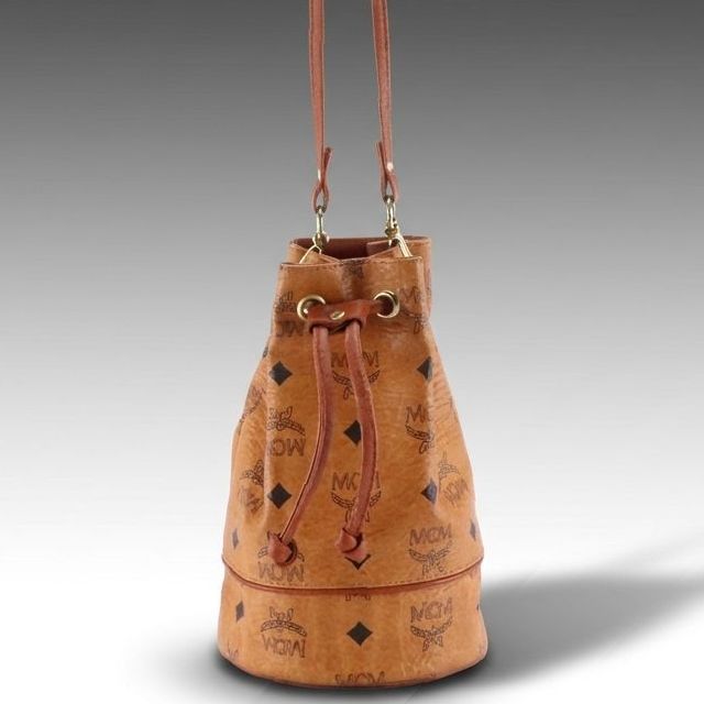 MCM Mini Drawstring Bucket Bag in Cognac Visetos Canvas