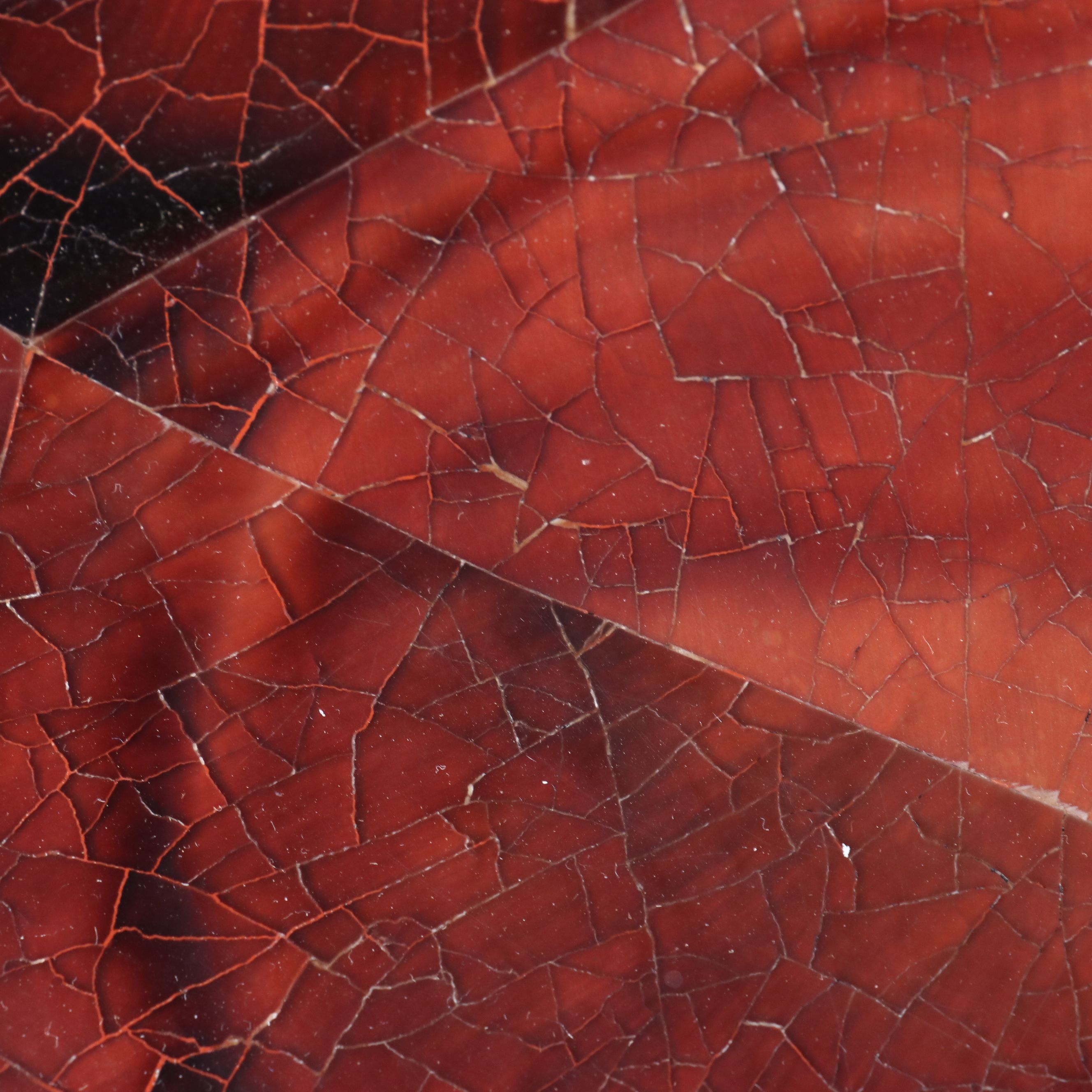 Crate & Barrel "Moreno" Red Agate Style Nesting Table Pair