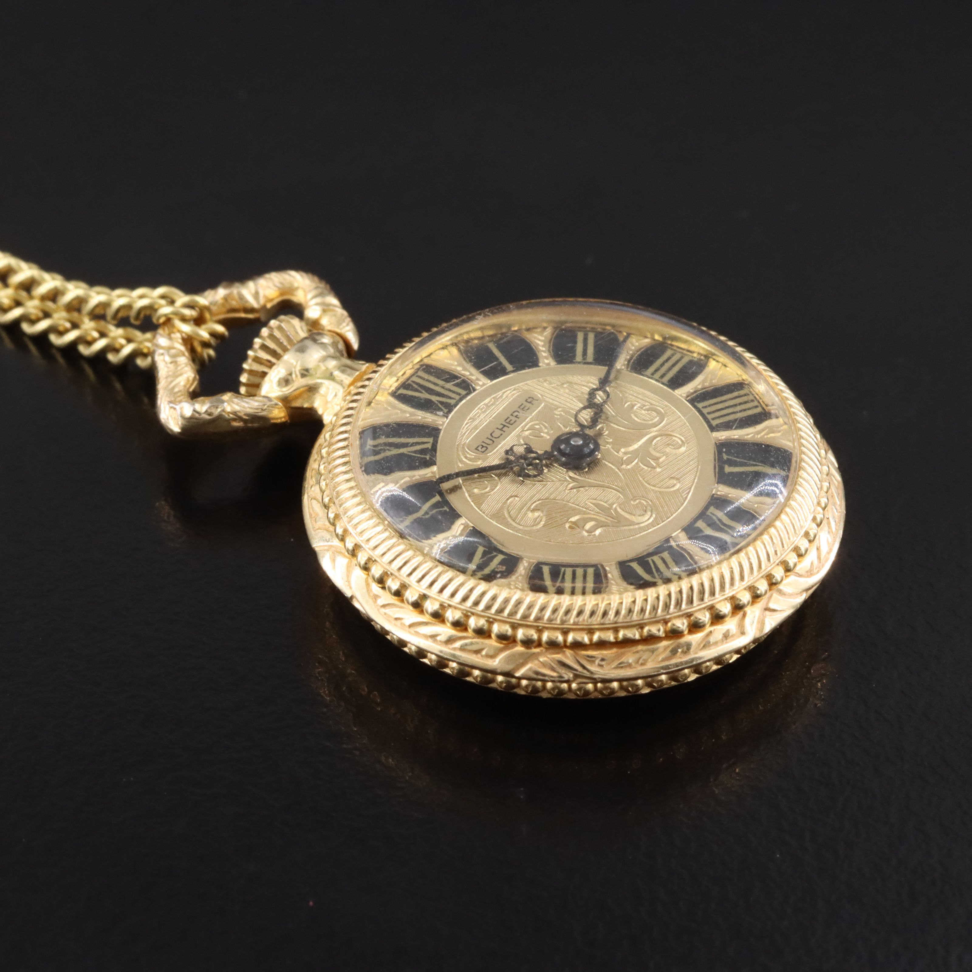Bucherer Gold Tone Ornate Scroll Work Pendant Watch